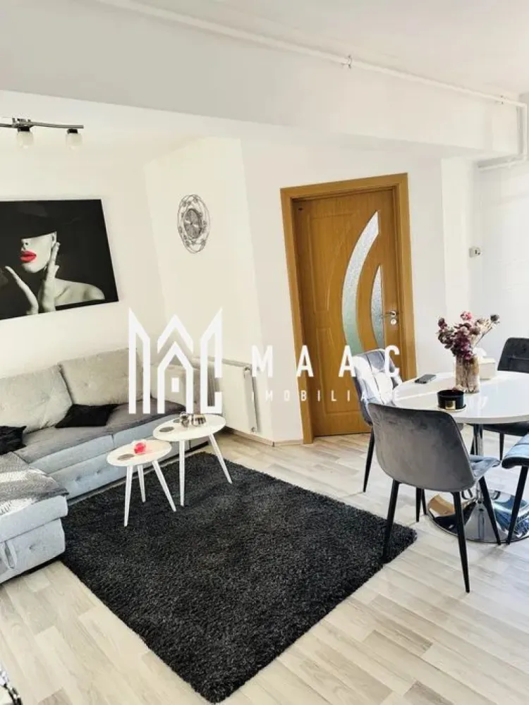 Apartament 2 camere I 50 MPU I Turnisor-Cartierul Alma - MAAC Imobiliare va propune spre vanzare un apartament spațios și luminos cu 2 camere, situat în cartierul Alma – Turnișor, la etajul 3 din 4 al unui imobil solid, bine întreținut. Apartamentul este decomandat și are o compartimentare practică, după cum urmează: living generos, bucătărie separată, dormitor, baie și balcon, oferind confort și funcționalitate. Locuința se vinde exact ca în poze, fiind complet mobilată și utilată cu electrocasnice moderne: frigider, aragaz, cuptor cu microunde și mașină de spălat. Apartamentul este într-o stare foarte bună, nu necesită reparații, fiind pregătit pentru mutare imediată – se predă la cheie.
Zona Turnișor este liniștită și foarte căutată, cu acces facil la magazine, școli, grădiniță, creșă și mijloace de transport în comun, ceea ce face apartamentul extrem de practic pentru viața de zi cu zi.
Este o alegere ideală pentru o familie, un cuplu sau pentru investiție, având un potențial foarte bun de închiriere.
Pentru mai multe detalii si programarea unei vizionari va rugam sa specificati ID: CP2891672.