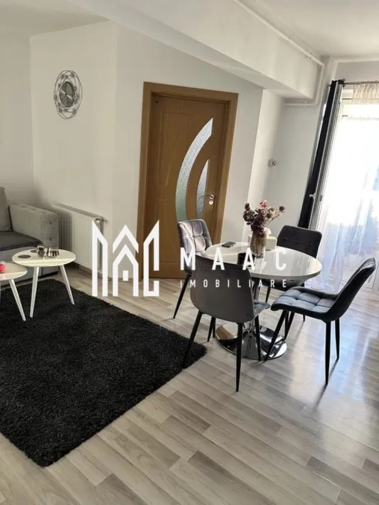 Apartament 2 camere I 50 MPU I Turnisor-Cartierul Alma - MAAC Imobiliare va propune spre vanzare un apartament spațios și luminos cu 2 camere, situat în cartierul Alma – Turnișor, la etajul 3 din 4 al unui imobil solid, bine întreținut. Apartamentul este decomandat și are o compartimentare practică, după cum urmează: living generos, bucătărie separată, dormitor, baie și balcon, oferind confort și funcționalitate. Locuința se vinde exact ca în poze, fiind complet mobilată și utilată cu electrocasnice moderne: frigider, aragaz, cuptor cu microunde și mașină de spălat. Apartamentul este într-o stare foarte bună, nu necesită reparații, fiind pregătit pentru mutare imediată – se predă la cheie.
Zona Turnișor este liniștită și foarte căutată, cu acces facil la magazine, școli, grădiniță, creșă și mijloace de transport în comun, ceea ce face apartamentul extrem de practic pentru viața de zi cu zi.
Este o alegere ideală pentru o familie, un cuplu sau pentru investiție, având un potențial foarte bun de închiriere.
Pentru mai multe detalii si programarea unei vizionari va rugam sa specificati ID: CP2891672.