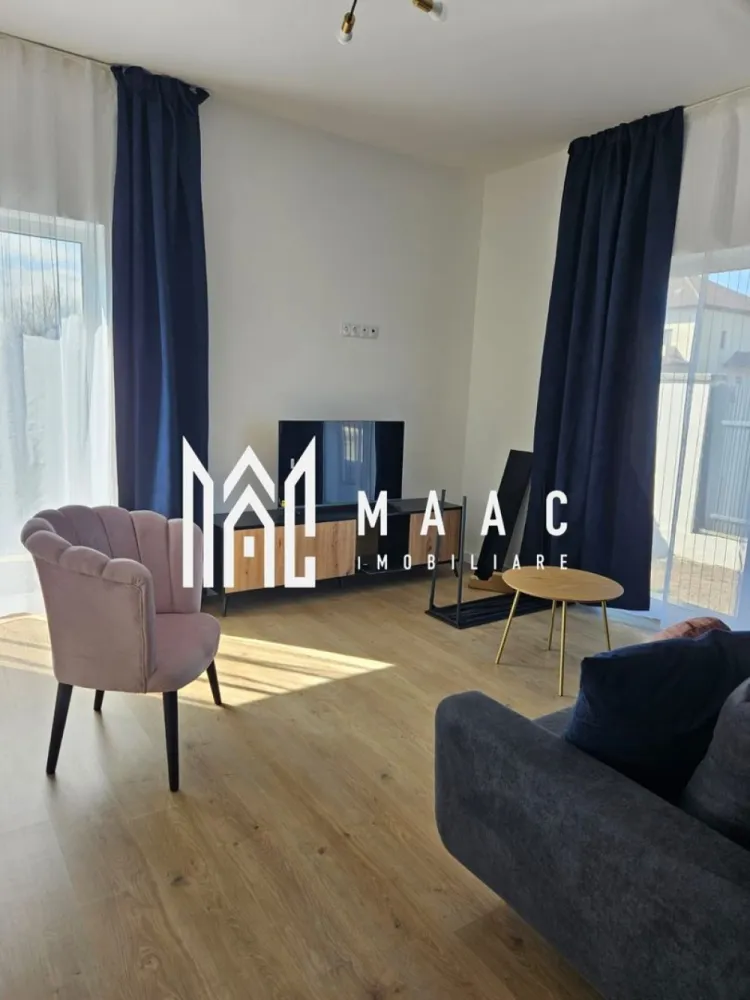 Casă modernă |4 Camere | Curte | 180 mp | Garaj | Șelimbăr - MAAC Imobiliare vă propune spre închiriere o casă spațioasă cu 4 camere, situată în Șelimbăr, ideală pentru o familie care își dorește confort, spațiu și intimitate.

Locuința are o suprafață utilă de aproximativ 180 mp și este compartimentată eficient pentru a oferi funcționalitate și confort.

Compartimentare:
• living spațios
• bucătărie închisă, complet mobilată și utilată
• 3 dormitoare
• 2 băi
• 2 balcoane

Proprietatea dispune de garaj, precum și de o curte generoasă, perfectă pentru relaxare sau petrecerea timpului liber. În curte se regăsește și o filigorie, ideală pentru momentele petrecute în aer liber alături de familie sau prieteni.

Casa este complet mobilată și utilată, fiind pregătită pentru mutare imediată.

Dotări și beneficii:
 încălzire în pardoseală
 garaj
 curte spațioasă
 filigorie în curte
 mobilată și utilată complet
 zonă liniștită, ideală pentru locuit

Această proprietate reprezintă o alegere excelentă pentru cei care își doresc confortul unei case spațioase, într-o zonă apreciată din Șelimbăr.

 Pentru mai multe detalii sau pentru programarea unei vizionări, vă rugăm să ne contactați, specificând ID:CP2955557