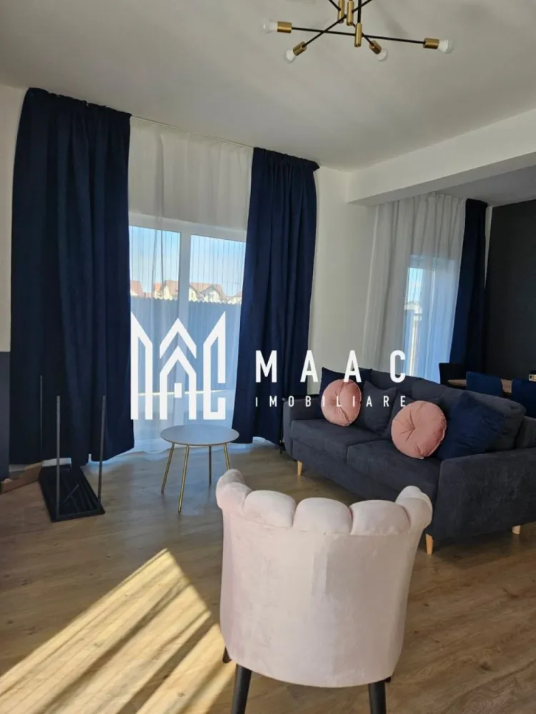 Casă modernă |4 Camere | Curte | 180 mp | Garaj | Șelimbăr - MAAC Imobiliare vă propune spre închiriere o casă spațioasă cu 4 camere, situată în Șelimbăr, ideală pentru o familie care își dorește confort, spațiu și intimitate.

Locuința are o suprafață utilă de aproximativ 180 mp și este compartimentată eficient pentru a oferi funcționalitate și confort.

Compartimentare:
• living spațios
• bucătărie închisă, complet mobilată și utilată
• 3 dormitoare
• 2 băi
• 2 balcoane

Proprietatea dispune de garaj, precum și de o curte generoasă, perfectă pentru relaxare sau petrecerea timpului liber. În curte se regăsește și o filigorie, ideală pentru momentele petrecute în aer liber alături de familie sau prieteni.

Casa este complet mobilată și utilată, fiind pregătită pentru mutare imediată.

Dotări și beneficii:
 încălzire în pardoseală
 garaj
 curte spațioasă
 filigorie în curte
 mobilată și utilată complet
 zonă liniștită, ideală pentru locuit

Această proprietate reprezintă o alegere excelentă pentru cei care își doresc confortul unei case spațioase, într-o zonă apreciată din Șelimbăr.

 Pentru mai multe detalii sau pentru programarea unei vizionări, vă rugăm să ne contactați, specificând ID:CP2955557