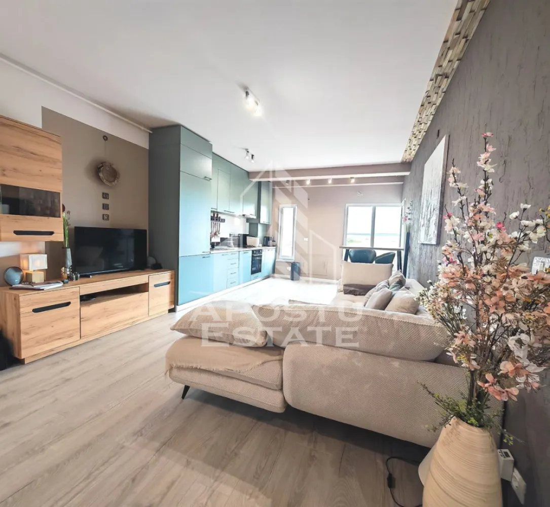 Apartament cu 2 camere de vânzare, Zona Torontalului, Timisoara - Agenţia imobiliara Apostu Estate va propune spre vânzare un apartament nou cu 2 camere ,situat în zona Torontalului,una dintre cele mai căutate zone din Timisoara . Ideal atât pentru locuinţa proprie , cat si pentru investiție 
 Imobilul este amplasat la etajul 1 din 3 cu o suprafață utilă de 52 mp și un balcon deschis de 3 mp 
 Compartimentare :
 -Bucătărie mobilată
 -Living mobilat open space cu bucătăria și ieșire pe balcon 
 -Dormitor matrimonial mobilat cu ieșire pe balcon 
 -Baie cu duș și geam la baie 
 -Balcon

 Apartamentul se vinde complet mobilat , conform pozelor
 
Confortul termic este asigurat de centrala proprie și sistemul de încălzire în pardoseală, care oferă o distribuție uniformă a căldurii și un ambient plăcut pe toată perioada sezonului rece.

 Beneficii suplimentare :
 - Compartimentare funcțională și modernă 
 - Zona liniștită perfectă pentru locuit sau investiţie
 -Geamuri Tripan 
 -Uși cu toc dublu 
 -Loc de parcare înscris în cf 

 Pentru mai multe detalii si programarea unei vizionari , va stam cu drag la dispoziţie .
 
 Agenţia imobiliara Apostu Estate vă oferă consultanta bancara gratuita prin intermediul colaboratorilor noştri pentru alegerea celui mai potrivit tip de credit , astfel încât tu să devii noul proprietar al acestui apartament
 ID INTERN: CP3209729