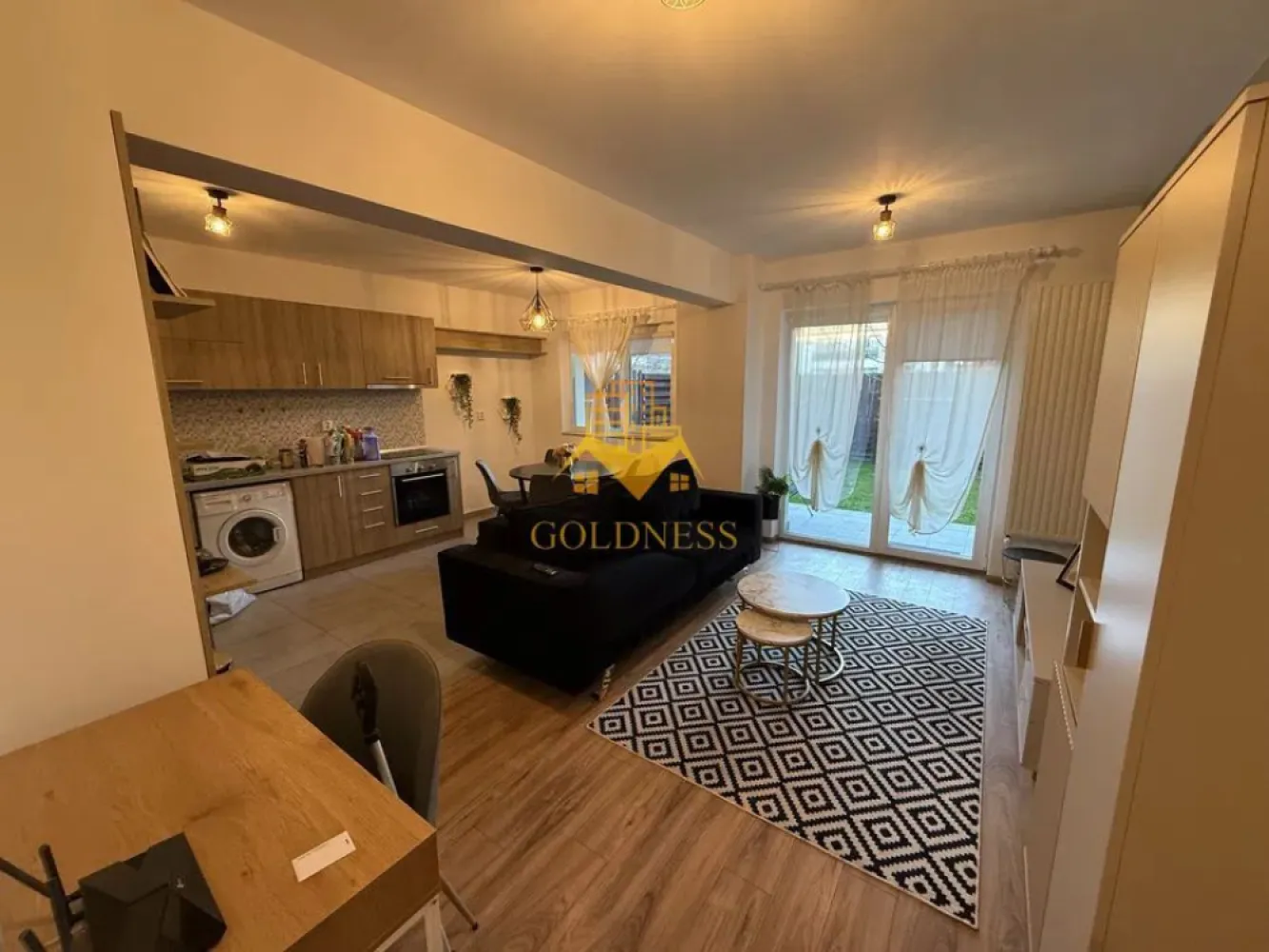 2 camere, modern, parcare, gradina de 75mp Buna Ziua, zona Mega Image - GOLDNESS Imobiliare vă propune spre închiriere un apartament cu 2 camere complet mobilat și utilat, la parter într-un imobil de 7 etaje, în cartierul Buna Ziua. Apartamentul este compartimentat astfel:
 - dormitor cu pat matrimonial, dressing, noptiere
 - living cu bucatarie open-space complet utilată, canapea extensibla, loc de servit masa 
 - baie cu vana, calorifer port prosop inox și dulap pentru depozitare.
 - curte de 75 mp

Imobilul este dotat cu toate cele necesare- centrală proprie, mașină de spălat haine, frigider, plită electrică, hotă, TV, etc. 
Se află în apropierea stațiilor de transport în comun, magazine, restaurante, spații verzi, farmacii, etc. 
Dispune de loc de parcare subterana!
Se percepe 2 luni de garantie!
Dacă sunteți interesați de acest apartament și doriți să îl vizionați, dar și pentru alte oferte sau detalii nu ezitați să ne contactați telefonic sau prin e-mail - goldnessimobiliare@gmail.com. Vă stăm la dispoziție!