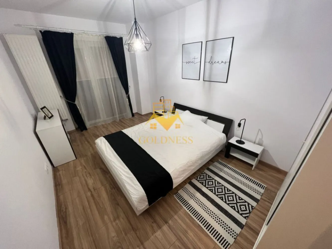 2 camere, modern, parcare, gradina de 75mp Buna Ziua, zona Mega Image - GOLDNESS Imobiliare vă propune spre închiriere un apartament cu 2 camere complet mobilat și utilat, la parter într-un imobil de 7 etaje, în cartierul Buna Ziua. Apartamentul este compartimentat astfel:
 - dormitor cu pat matrimonial, dressing, noptiere
 - living cu bucatarie open-space complet utilată, canapea extensibla, loc de servit masa 
 - baie cu vana, calorifer port prosop inox și dulap pentru depozitare.
 - curte de 75 mp

Imobilul este dotat cu toate cele necesare- centrală proprie, mașină de spălat haine, frigider, plită electrică, hotă, TV, etc. 
Se află în apropierea stațiilor de transport în comun, magazine, restaurante, spații verzi, farmacii, etc. 
Dispune de loc de parcare subterana!
Se percepe 2 luni de garantie!
Dacă sunteți interesați de acest apartament și doriți să îl vizionați, dar și pentru alte oferte sau detalii nu ezitați să ne contactați telefonic sau prin e-mail - goldnessimobiliare@gmail.com. Vă stăm la dispoziție!