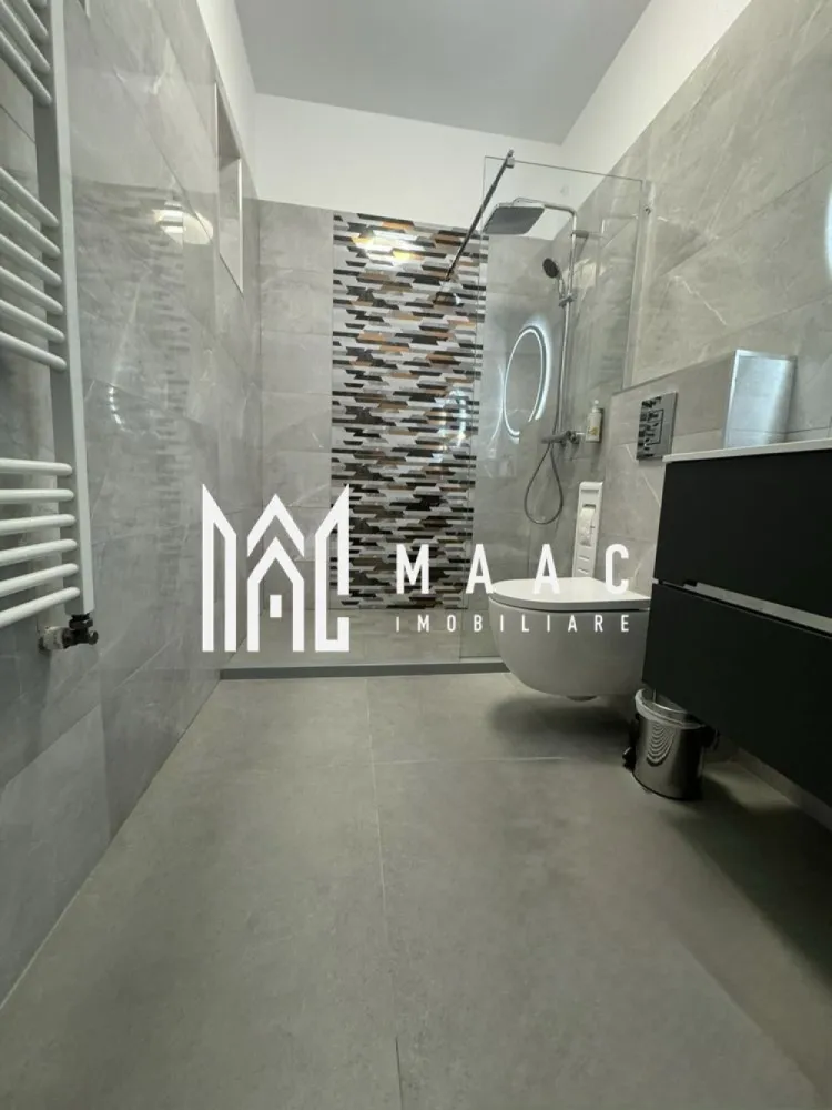 Apartamente 3 camere | Parcare | 105 MP | Zonă Centrală - MAAC Imobiliare vă propune spre vânzare două apartamente situate la casă, într-o zonă centrală a orașului Sibiu, într-o locație ideală atât pentru locuire, cât și pentru activități profesionale.

Proprietățile sunt înscrise pe același CF și pot fi utilizate pentru locuință, cabinet medical, sediu de firmă, birouri sau alte activități, beneficiind de vizibilitate bună datorită geamurilor orientate către stradă.

Imobilele se află într-o stare foarte bună și nu necesită investiții suplimentare. Acoperișul este nou, clădirea beneficiază de izolație termică exterioară, iar interiorul a fost complet renovat.

Proprietatea dispune, de asemenea, de pivniță, loc de parcare și o cotă parte de 33% din curtea comună, oferind spațiu suplimentar și confort.

Zona centrală reprezintă un avantaj important, cu acces rapid către instituții, magazine, restaurante, transport public și principalele puncte de interes ale orașului.

Pentru mai multe detalii sau pentru a programa o vizionare, vă rugăm să ne contactați.
Specificați ID-ul CP2959701.