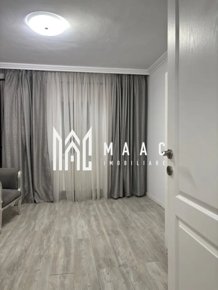 Apartament 3 camere Traian | Parter | Centrala Termica - MAAC Imobiliare vă propune spre vânzare un apartament renovat cu 3 camere, situat la parterul unui bloc P+4, într-un imobil liniștit, cu doar 2 apartamente pe etaj. Apartamentul are o suprafață utilă de 64 mp și este total decomandat, compartimentarea fiind practică și bine organizată: living spațios, 2 dormitoare, bucătărie separată, hol generos și baie. În prezent există și posibilitatea amenajării unei a doua băi de serviciu, spațiul fiind folosit momentan ca dressing. Imobilul a fost renovat integral și până de curând a funcționat ca salon estetic, fiind o opțiune excelentă atât pentru locuință, cât și pentru activitate comercială (salon, birou, cabinet etc.), datorită poziționării la parter. Îmbunătățiri și dotări: renovat integral centrală termică proprie sistem de alarmă se predă gol și proaspăt zugrăvit în alb Datorită compartimentării decomandate și a poziționării la parter, apartamentul este ideal atât pentru locuit, cât și pentru investiție sau activități comerciale. Pentru mai multe detalii sau pentru a programa o vizionare, contactați echipa MAAC Imobiliare. CP2896492