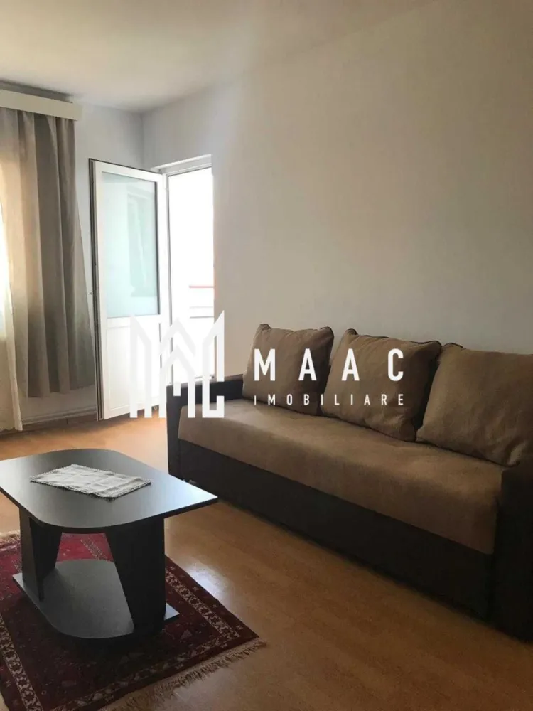 Apartament 2 camere | Balcon | Etaj 3 | Strand - Apartament 2 camere de închiriat Sibiu – 54 mp – balcon – etaj 3 – cartierul Ștrand

MAAC Imobiliare vă propune spre închiriere un apartament cu 2 camere situat în cartierul Ștrand din Sibiu, la etajul 3 al unui imobil construit între 1977 și 1990.
Detalii apartament

Suprafață utilă: 54 mp
Etaj: 3

Compartimentare:

living luminos
dormitor
bucătărie
baie
balcon cu vedere spre oraș
Blocul este izolat termic, iar balconul este închis, ceea ce contribuie la cheltuieli reduse de întreținere.

Avantaje locație

Apartamentul este situat în cartierul Ștrand, aproape de:
Parcul Sub Arini
Complexul Studențesc Sibiu
restaurante, cafenele și magazine
stații de transport public

Pentru mai multe informații sau pentru a programa o vizionare, nu ezitați să ne contactați, specificand ID: CP2974066