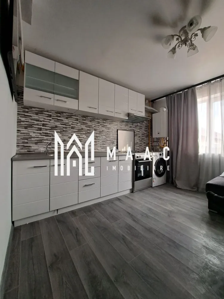 Apartament 2 camere | Traian | mobilat si utilat | 44mp - MAAC IMOBILIARE vă propune spre vânzare un apartament modern cu 2 camere, situat la etajul 4, în cartierul Traian.

Proprietatea face parte dintr-un imobil nou, construit din BCA, și beneficiază de o suprafață utilă de 44 mp, fiind inteligent compartimentată pe două niveluri – ideală pentru un stil de viață modern și confortabil.

Compartimentare:

Parter: living luminos cu bucătărie open-space și baie

Etaj: 2 dormitoare primitoare, bine luminate natural

Apartamentul se vinde complet mobilat și utilat, fiind nelocuit până în prezent – totul este nou, pregătit pentru viitorul proprietar.

Datorită compartimentării eficiente și a poziționării, proprietatea reprezintă o alegere excelentă atât pentru locuință personală, cât și pentru investiție (închiriere pe termen lung sau regim hotelier).

Localizare avantajoasă: situat în cartierul Traian, cu acces facil la mijloace de transport, magazine, unități de învățământ și centre comerciale.

Pentru mai multe detalii sau pentru programarea unei vizionări, echipa MAAC IMOBILIARE vă stă cu drag la dispoziție!
CP2984243