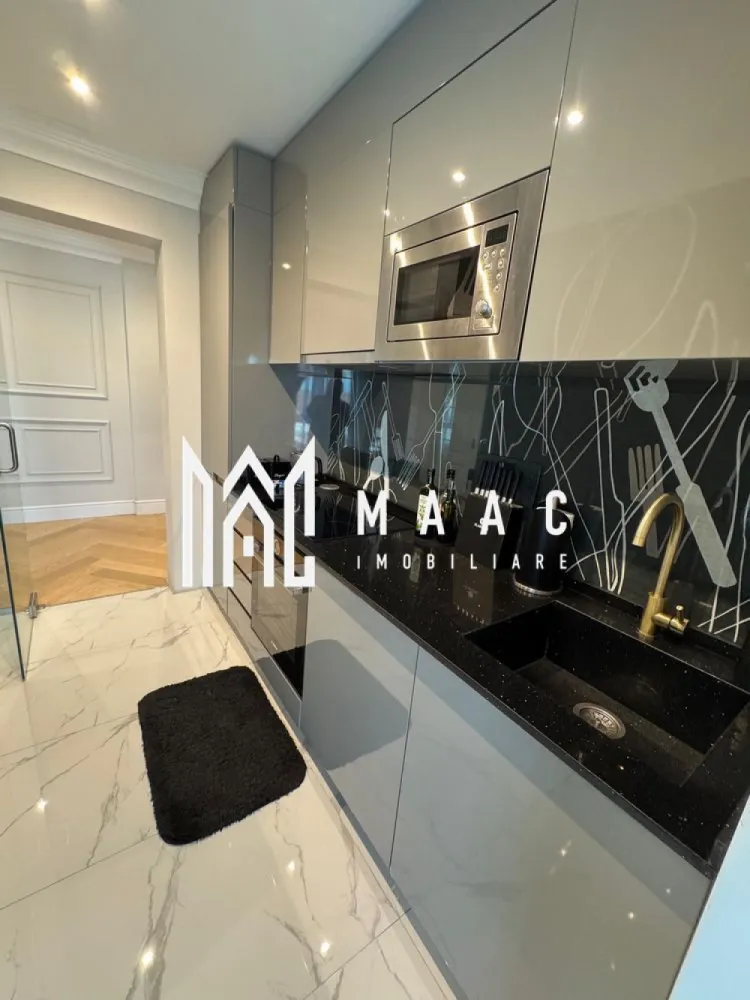 Apartament 2 camere | Balcon | Parcare | Etaj 3 | Parcul Sub Arini - Apartament premium de închiriat Sibiu – 67 mp – parcare subterană – lângă Parcul Sub Arini

MAAC Imobiliare vă propune spre închiriere un apartament situat într-una dintre cele mai apreciate zone din Sibiu, în imediata apropiere de Parcul Sub Arini.

Locuința oferă un echilibru între confort, liniște și acces rapid către principalele puncte de interes ale orașului.

Detalii apartament
Suprafață utilă: 67 mp
Balcon generos
Compartimentare eficientă
Spații luminoase și bine organizate
Dotări și avantaje
Parcare subterană inclusă
Lift cu acces direct din parcare
Finisaje de calitate
Apartament complet pregătit pentru locuire
Ambient plăcut și funcțional
Avantaje locație
La câteva minute de Parcul Sub Arini
Zonă liniștită și foarte căutată
Acces rapid către centru, restaurante și cafenele
Aproape de transport public și facilități urbane

Disponibilitate: imediată.

Pentru mai multe informații sau pentru a programa o vizionare specificati ID: CP2985650.