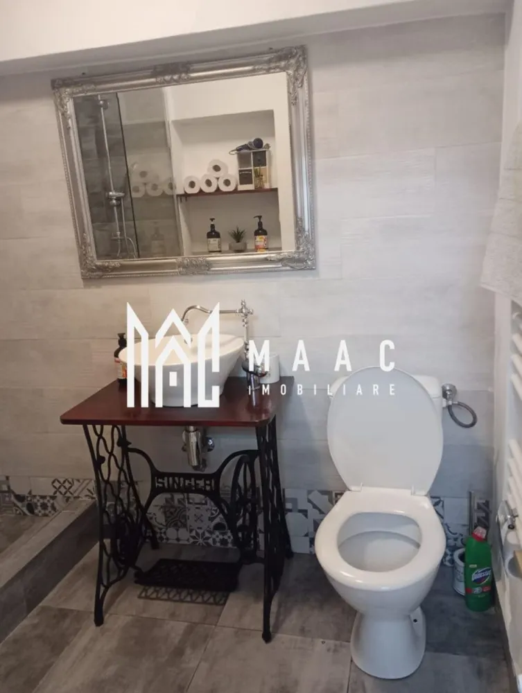 Apartament de vânzare Sibiu 2 camere | Central | 65 mp, 2 centrale - Apartament de vânzare în zona Centrală din Sibiu, cu 65 mp utili și configurare menționată în două apartamente cu intrări și utilități separate, finisat modern.

Detalii proprietate:
• Suprafață utilă: 65 mp
• Suprafață construită: 78 mp
• Compartimentare: decomandat
• Stare interioară: finisat modern
• Construcție finalizată, structură din cărămidă
• În fișa CRM sunt trecute 2 camere, 1 dormitor, 1 baie și 1 bucătărie
• Descrierea existentă indică o configurare în 2 apartamente cu intrări și utilități separate
• Dotări menționate în descrierea existentă: 2 centrale termice
• An construcție menționat în fișa CRM: 1800

Proprietatea este poziționată în zona Centrală din Sibiu, conform datelor din fișa CRM.

Pentru detalii suplimentare și programarea unei vizionări, contactați echipa MAAC Imobiliare și menționați Cod anunț CP2907682.

Conținut optimizat cu AI, aprobat de agent uman.