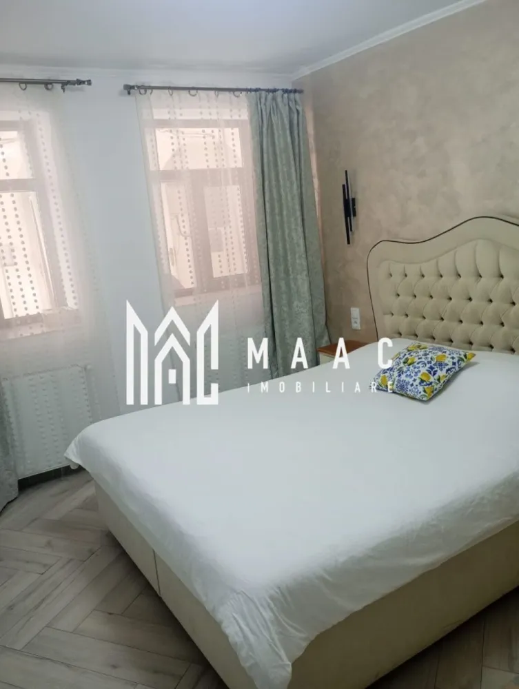 Apartament de vânzare Sibiu 2 camere | Central | 65 mp, 2 centrale - Apartament de vânzare în zona Centrală din Sibiu, cu 65 mp utili și configurare menționată în două apartamente cu intrări și utilități separate, finisat modern.

Detalii proprietate:
• Suprafață utilă: 65 mp
• Suprafață construită: 78 mp
• Compartimentare: decomandat
• Stare interioară: finisat modern
• Construcție finalizată, structură din cărămidă
• În fișa CRM sunt trecute 2 camere, 1 dormitor, 1 baie și 1 bucătărie
• Descrierea existentă indică o configurare în 2 apartamente cu intrări și utilități separate
• Dotări menționate în descrierea existentă: 2 centrale termice
• An construcție menționat în fișa CRM: 1800

Proprietatea este poziționată în zona Centrală din Sibiu, conform datelor din fișa CRM.

Pentru detalii suplimentare și programarea unei vizionări, contactați echipa MAAC Imobiliare și menționați Cod anunț CP2907682.

Conținut optimizat cu AI, aprobat de agent uman.