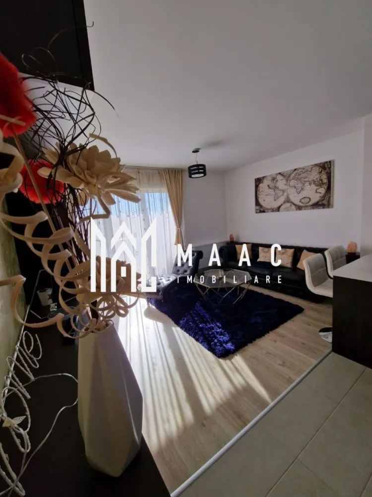 Apartament 3 camere Sibiu | Mihai Viteazul | nedecomandat, balcon - Apartament cu 3 camere de închiriat în Sibiu, zona Mihai Viteazul, cu 64 mp utili, balcon și mobilare completă, situat aproape de Dedeman.

Detalii proprietate:
• Suprafață utilă: 64 mp
• Compartimentare: nedecomandat
• Configurație cu 2 dormitoare și living open space cu bucătăria
• Etaj 2
• An construcție: 2000
• Se închiriază complet mobilat și utilat
• Balcon
• Aparat de aer condiționat montat recent în living

Proprietatea este amplasată în zona Mihai Viteazul, în apropiere de Dedeman, reper util pentru orientare și accesul de zi cu zi în oraș.

Pentru detalii suplimentare și programarea unei vizionări, contactați echipa MAAC Imobiliare și menționați Cod anunț CP3213032.

Conținut optimizat cu AI, aprobat de agent uman.