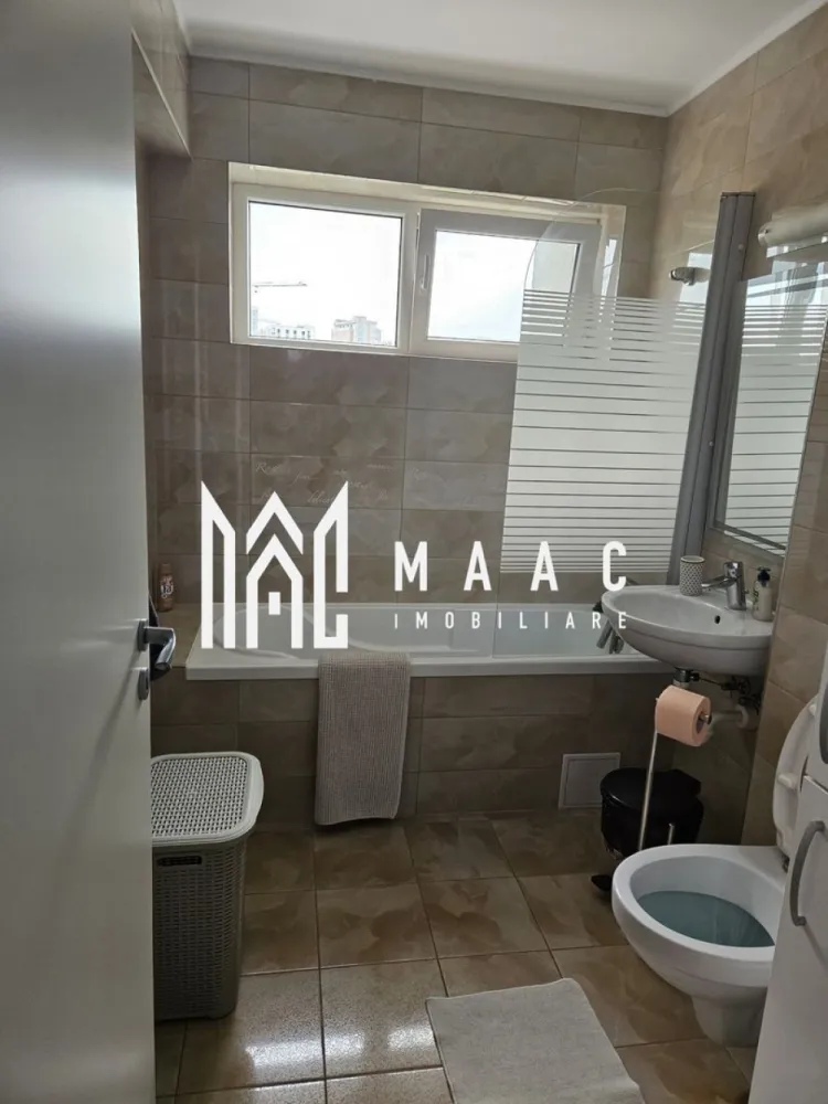 Apartament 3 camere Sibiu | Mihai Viteazul | nedecomandat, balcon - Apartament cu 3 camere de închiriat în Sibiu, zona Mihai Viteazul, cu 64 mp utili, balcon și mobilare completă, situat aproape de Dedeman.

Detalii proprietate:
• Suprafață utilă: 64 mp
• Compartimentare: nedecomandat
• Configurație cu 2 dormitoare și living open space cu bucătăria
• Etaj 2
• An construcție: 2000
• Se închiriază complet mobilat și utilat
• Balcon
• Aparat de aer condiționat montat recent în living

Proprietatea este amplasată în zona Mihai Viteazul, în apropiere de Dedeman, reper util pentru orientare și accesul de zi cu zi în oraș.

Pentru detalii suplimentare și programarea unei vizionări, contactați echipa MAAC Imobiliare și menționați Cod anunț CP3213032.

Conținut optimizat cu AI, aprobat de agent uman.