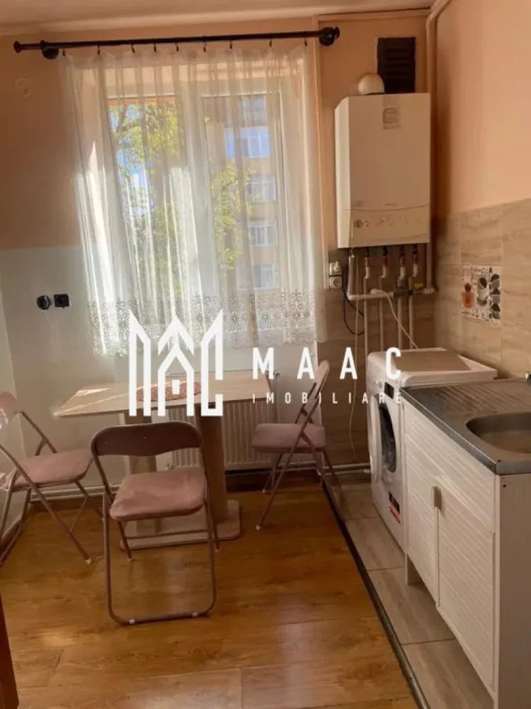 Apartament 2 camere decomandat | Cedonia, Sibiu | 50 mp, bloc 1990 - Apartament de închiriat în Sibiu, zona Cedonia, cu 2 camere decomandate, 50 mp utili și etaj 2 din 5, complet mobilat pentru mutare fără amenajări suplimentare.

Detalii proprietate:
• Suprafață utilă: 50 mp
• Suprafață construită: 60 mp
• Compartimentare: decomandat
• Etaj 2 din 5
• Stare interioară: bună
• Construcție finalizată
• An construcție: 1990
• Se închiriază complet mobilat
• Loc de parcare disponibil

Zona Cedonia oferă acces rapid la magazine, inclusiv non-stop, farmacii, dispensar, școală, grădiniță și stație de autobuz, ceea ce susține un program zilnic practic și legături facile către punctele de interes din oraș.

Contactați echipa MAAC Imobiliare pentru detalii suplimentare și programarea unei vizionări. Cod anunț CP3213307.

Conținut optimizat cu AI, aprobat de agent uman.