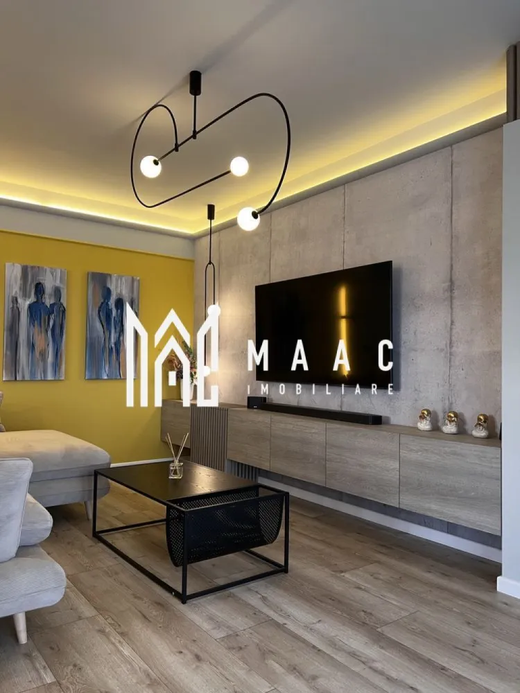 Duplex | 210 mp | Curte 200 mp | 5 Camere | 3 Băi | Șelimbăr - MAAC Imobiliare vă propune spre vânzare o casă spațioasă și elegantă, ideală pentru o familie care își dorește confort, funcționalitate și un ambient modern, bine organizat. Proprietatea beneficiază de o suprafață utilă de 211 mp și o curte de aproximativ 200 mp, oferind un echilibru optim între spațiul interior generos și zona exterioară dedicată relaxării.

Locuința este compartimentată inteligent, cu încăperi luminoase și bine dimensionate, fiind potrivită atât pentru locuire permanentă, cât și pentru investiție pe termen lung. Se vinde complet mobilată și utilată, cu finisaje de calitate, gata pentru mutare imediată fără necesitatea unor investiții suplimentare.

Compartimentare:
-5 camere spațioase, ideale pentru living, dormitoare sau birou
-dressing generos de 14 mp
-3 băi moderne, amenajate cu atenție la detalii

Exterior:
-curte privată de aproximativ 200 mp, ideală pentru relaxare sau amenajare spațiu verde
-carport pentru protecția mașinii

Proprietatea se evidențiază prin suprafețele generoase, compartimentarea practică și atmosfera primitoare, fiind o alegere excelentă pentru cei care caută o locuință complet echipată într-un cadru confortabil.

Pentru mai multe detalii, vă rugăm să menționați CP2988696 la telefon.