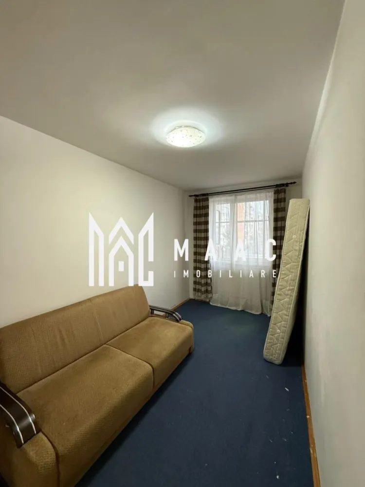 Apartament 3 camere | Etaj 3 | 2 Balcoane | Mihai Viteazu - Apartament 3 camere de vânzare Sibiu – 76 mp – 2 balcoane – etaj 3 – pivniță
MAAC Imobiliare vă propune spre vânzare un apartament cu 3 camere, decomandat, situat la etajul 3 într-un bloc din cărămidă, în Sibiu.

Locuința este mobilată și utilată, fiind potrivită atât pentru locuit, cât și pentru investiție în închiriere.

Detalii apartament
Suprafață utilă: 76 mp
2 balcoane mari
Etaj: 3
Compartimentare decomandată:
hol
bucătărie cu balcon
sufragerie
dormitor 1
dormitor 2 cu balcon
baie
debara
Pivniță mare pentru depozitare
Dotări și avantaje
Centrală termică proprie
Aer condiționat
Mobilat și utilat
Mașină de spălat rufe
Mașină de spălat vase
Bloc din cărămidă – confort termic și fonic mai bun
Compartimentare eficientă și spații generoase
Avantaje
Apartament spațios, ideal pentru familie
Două balcoane – mai mult spațiu și lumină
Costuri eficiente datorită centralei proprii
Potrivit pentru locuință sau investiție

Pentru mai multe informații sau pentru a programa o vizionare specificati ID: CP2993959