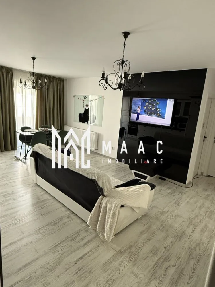 Apartament 3 camere | Parcare | Decomandat | City Rezidence - MAAC Imobiliare vă propune spre vânzare un apartament spațios în City Residence, situat într-o zonă centrală a Sibiului, ideal atât pentru locuire personală, cât și pentru investiție.

Proprietatea are o suprafață utilă de 64 mp și beneficiază de o terasă generoasă de 12 mp, un avantaj important pentru confortul zilnic. Apartamentul este amplasat la etajul 4 din 5, într-un imobil modern dotat cu lift.

Locuința se vinde mobilată și utilată, fiind pregătită pentru mutare imediată sau pentru exploatare în regim de închiriere.

Compartimentare practică

Living open space cu bucătărie

2 dormitoare

2 băi

Hol

Terasă mare – 12 mp, ideală pentru zonă de relaxare

Avantaje

Ansamblu rezidențial modern – City Residence

Zonă centrală, cu acces rapid către punctele de interes

Apartament luminos și bine compartimentat

Lift în imobil

Terasă spațioasă, greu de găsit la această categorie

Potrivit pentru locuit sau investiție cu randament bun

 Localizare: City Residence, Sibiu
 Pentru mai multe detalii și programarea unei vizionări, vă rugăm să ne contactați menționând ID: CP2945687.