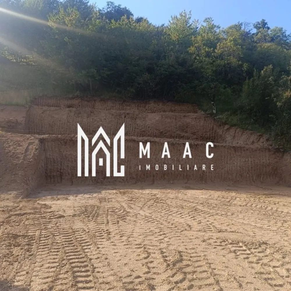 TEREN INTRAVILAN 1641 mp | PUZ APROBAT | Cisnadioara - MAAC Imobiliare vă propune spre vânzare un teren intravilan situat în zona Cisnădioara, pe strada Silvicultorilor, într-o locație liniștită, ideală pentru construcția unei locuințe permanente sau a unei case de vacanță. Amplasamentul oferă un cadru natural deosebit, cu priveliște frumoasă, fiind potrivit pentru cei care își doresc aer curat, intimitate și un stil de viață relaxat, departe de agitația urbană.

Terenul are o suprafață de 1641 mp și beneficiază de o deschidere de 17,5 metri la stradă, ceea ce permite multiple opțiuni de construire și valorificare eficientă a spațiului. Proprietatea dispune de utilități precum apă, curent și canalizare, facilitând dezvoltarea rapidă a unui proiect rezidențial.

Această proprietate reprezintă o oportunitate potrivită atât pentru investiție, cât și pentru dezvoltarea unei locuințe într-o zonă apreciată din apropierea Sibiului.

Se acceptă schimb cu apartament în Sibiu.

Pentru mai multe detalii, vă rugăm să menționați telefonic numărul CP2988018.