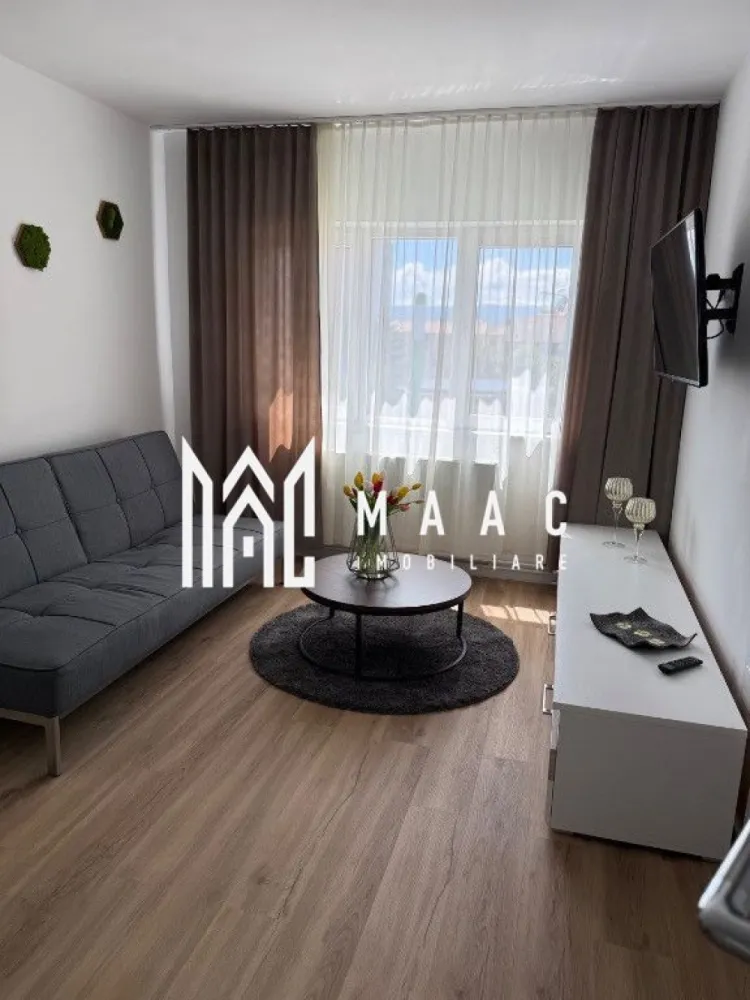 Apartament 2 camere semidecomandat | Hipodrom 1 | 48 mp, renovat - Apartament de vânzare în Sibiu, în zona Hipodrom 1, cu 2 camere semidecomandate, 48 mp utili, renovat și complet mobilat, pregătit pentru mutare.

Detalii proprietate:
• Suprafață utilă de 48 mp și suprafață construită de 67,2 mp
• Compartimentare semidecomandată, cu 1 dormitor, 1 baie și 1 bucătărie
• Situat la etajul 4 din 4, cu mansardă deasupra
• Imobil finalizat în anul 1988
• Apartament renovat, cu instalație electrică nouă și instalație sanitară nouă
• Se vinde complet mobilat și utilat, fără investiții suplimentare necesare

Zona oferă acces rapid către magazine, școli, grădinițe și mijloace de transport în comun, cu toate facilitățile utile pentru programul de zi cu zi. Amplasarea în Hipodrom 1 menține legătura rapidă cu punctele de interes din oraș.

Cod anunț CP3213955. Contactați echipa MAAC Imobiliare pentru detalii suplimentare și pentru programarea unei vizionări.

Conținut optimizat cu AI, aprobat de agent uman.