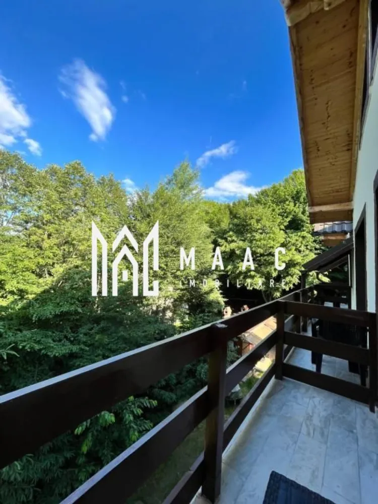 Pensiune Turistică | 360MPU | Curte | Oportunitate Investiție | Porumbacu de Sus - MAAC Imobiliare vă propune spre vânzare o pensiune / casă de vacanță complet funcțională, situată în Porumbacu de Sus, una dintre cele mai apreciate zone turistice din județul Sibiu, o proprietate cu activitate solidă de peste 4 ani și flux constant de turiști, pregătită pentru preluare imediată.

Construită în anul 2021 și menținută impecabil, proprietatea oferă o suprafață utilă de 360 mp, fiind organizată eficient pentru desfășurarea activităților turistice:

-clădire principală dispusă pe parter, etaj și pod mansardat
-5 unități de cazare, fiecare cu baie proprie și balcon
-un apartament, o cameră triplă și trei camere duble

Spațiile sunt luminoase, bine întreținute și adaptate cerințelor actuale din turism:
-living generos

-bucătărie complet utilată

-6 dormitoare

-6 băi

-terasă de aproximativ 20 mp

În exterior, proprietatea oferă facilități apreciate de turiști:
-bucătărie de vară
-foișor
-zonă de barbecue

Dotări tehnice și utilități:
-încălzire centrală pe peleți
-izolație exterioară de 10 cm
-acoperiș Bilka
-alimentare cu apă din rețea și fântână proprie
-contor trifazic

Proprietatea este amplasată pe un teren de 1.000 mp, dintre care aproximativ 900 mp reprezintă curte liberă, oferind posibilitatea extinderii cu facilități suplimentare precum saună, ciubăr sau noi spații de cazare.

În partea din spate a terenului se află o cabană secundară din lemn, de aproximativ 50 mp, dispusă P+M, locuibilă, ce necesită renovare și oferă potențial pentru extinderea capacității sau proiecte independente.

Curtea dispune de:
-6–7 locuri de parcare
-acces facil
-cadru natural liniștit

Poziționarea este un avantaj major, datorită proximității față de obiective turistice importante și trasee montane, ceea ce asigură vizibilitate și cerere constantă pe tot parcursul anului.

Proprietatea este ideală pentru investitori în turism, familii care doresc o afacere funcțională sau pentru dezvoltarea unui mini-complex turistic.

Pentru mai multe detalii și vizionarea acestei proprietăți /oportunități de investiție ,contactați-ne și specificați codul de identificare al proprietății ID: CP2819284