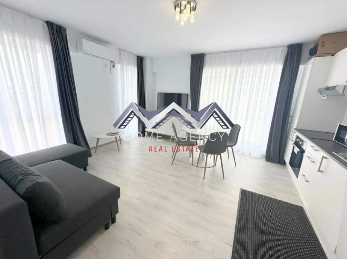 Apartament 2 camere Otopeni + terasă 30 mp | prima închiriere - Dacă visezi la un apartament luminos, spațios și bine amplasat, tocmai l-ai găsit! 
Acest apartament cu 2 camere, situat într-o zonă accesibilă și bine conectată la toate punctele de interes din Otopeni este pregătit să devină noua ta casă. Cu o suprafață utilă de 50 mp și o terasă impresionantă de 30 mp, acest spațiu oferă combinația ideală între confort și funcționalitate. 

Living-ul generos, unit cu bucătăria open space și zona de luat masa, creând o atmosferă elegantă, spațioasă și primitoare, ideală atât pentru relaxare, cât și pentru momentele petrecute cu cei dragi. Ferestrele mari lasă lumina naturală să pătrundă din plin și îți asigură lumină pe tot parcursul zilei. În plus, terasa spațioasă devine un loc perfect pentru seri relaxante, dimineți liniștite sau întâlniri cu prietenii, fiind un adevărat colț de liniște în mijlocul orașului. 

Apartamentul este la prima închiriere, astfel că te vei bucura de un spațiu impecabil, amenajat cu atenție la detalii și dotat cu tot ce ai nevoie pentru un stil de viață modern și confortabil. Ai la dispoziție un loc de parcare dedicat, ceea ce înseamnă că nu vei mai pierde timp căutând unde să parchezi, iar accesul către toate zonele importante ale orașului și nu numai este foarte rapid și facil. 

Dacă îți dorești un apartament primitor, spațios și bine poziționat, acesta este alegerea perfectă. 
Contactează-mă pentru mai multe detalii sau pentru a programa o vizionare!