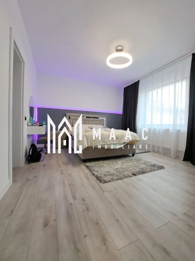 Casa deosebita P+E |mobilata si utilata| teren 1277mp| Vladești - MAAC IMOBILIARE vă propune spre vânzare o proprietate de excepție, situată stradal în Vlădești, județul Vâlcea
Descoperă o locuință completă, unde spațiul generos, compartimentarea inteligentă și poziționarea excelentă se îmbină perfect pentru a crea un cămin ideal pentru o familie.
Amplasată stradal, într-o zonă excelentă, cu acces rapid către oraș și toate facilitățile necesare, casa îmbină perfect eleganța, spațiul generos și confortul modern.
Casa construita in anul 2025, dispune de toate utilitățile (apă, gaz, curent electric, canalizare), asigurând confortul necesar unei locuințe moderne.
Localizare premium:
Imobilul este amplasat la strada principală, într-o zonă extrem de accesibilă, având în imediata apropiere toate punctele de interes necesare, dar si acces rapid către Râmnicu Vâlcea.
Detalii proprietate:
Regim de înălțime: Parter + Etaj
Suprafață totală: 410 mp
Teren: 1.277 mp
Construcție solidă, bine compartimentată
Proprietate intabulată, cu acte la zi
Compartimentare – Parter:
Parterul este gândit pentru zona de zi și activitățile comune:
Living generos (40,6 mp) – spațiu luminos, ideal pentru relaxare și socializare
Bucătărie spațioasă (18,4 mp) – complet mobilată și utilată
Birou (17 mp) – perfect pentru work-from-home
Baie + grup sanitar
Debara / spații de depozitare
Hol amplu + casa scării (19,9 mp)
Terasă (32,3 mp) – ideală pentru petrecerea timpului liber
Compartimentare – Etaj:
Zona de noapte oferă confort și intimitate:
3 dormitoare (inclusiv unul matrimonial foarte generos de 26,6 mp)
2 dressinguri
3 băi – pentru confort maxim
Hol spațios (19,1 mp)
Terasă mare (41,5 mp) – priveliște deschisă, perfectă pentru relaxare
Exterior și facilități:
Curte generoasă, ideală pentru amenajare grădină, foișor sau zonă de relaxare
Anexă gospodărească (27,8 mp) – perfectă pentru depozitare sau diverse activități
Acces facil auto în curte
Proprietate ce oferă intimitate și multiple posibilități de amenajare
✅ Avantaje majore:
✔ Locație excelentă – stradal
✔ Casă complet mobilată și utilată
✔ Nu necesită investiții – mutare imediată
✔ Compartimentare ideală pentru familie numeroasă
✔ Suprafață mare utilă + teren generos
✔ Potrivită atât pentru locuință, cât și pentru investiție (ex: pensiune, sediu firmă)
Această proprietate reprezintă o oportunitate rară pe piață — o casă spațioasă, modernă și bine poziționată, pregătită să devină „acasă” fără niciun compromis.
📞 Pentru detalii suplimentare și programarea unei vizionări, contactați echipa MAAC IMOBILIARE!
CP3004798