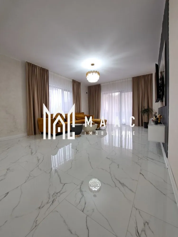 Casa deosebita P+E |mobilata si utilata| teren 1277mp| Vladești - MAAC IMOBILIARE vă propune spre vânzare o proprietate de excepție, situată stradal în Vlădești, județul Vâlcea
Descoperă o locuință completă, unde spațiul generos, compartimentarea inteligentă și poziționarea excelentă se îmbină perfect pentru a crea un cămin ideal pentru o familie.
Amplasată stradal, într-o zonă excelentă, cu acces rapid către oraș și toate facilitățile necesare, casa îmbină perfect eleganța, spațiul generos și confortul modern.
Casa construita in anul 2025, dispune de toate utilitățile (apă, gaz, curent electric, canalizare), asigurând confortul necesar unei locuințe moderne.
Localizare premium:
Imobilul este amplasat la strada principală, într-o zonă extrem de accesibilă, având în imediata apropiere toate punctele de interes necesare, dar si acces rapid către Râmnicu Vâlcea.
Detalii proprietate:
Regim de înălțime: Parter + Etaj
Suprafață totală: 410 mp
Teren: 1.277 mp
Construcție solidă, bine compartimentată
Proprietate intabulată, cu acte la zi
Compartimentare – Parter:
Parterul este gândit pentru zona de zi și activitățile comune:
Living generos (40,6 mp) – spațiu luminos, ideal pentru relaxare și socializare
Bucătărie spațioasă (18,4 mp) – complet mobilată și utilată
Birou (17 mp) – perfect pentru work-from-home
Baie + grup sanitar
Debara / spații de depozitare
Hol amplu + casa scării (19,9 mp)
Terasă (32,3 mp) – ideală pentru petrecerea timpului liber
Compartimentare – Etaj:
Zona de noapte oferă confort și intimitate:
3 dormitoare (inclusiv unul matrimonial foarte generos de 26,6 mp)
2 dressinguri
3 băi – pentru confort maxim
Hol spațios (19,1 mp)
Terasă mare (41,5 mp) – priveliște deschisă, perfectă pentru relaxare
Exterior și facilități:
Curte generoasă, ideală pentru amenajare grădină, foișor sau zonă de relaxare
Anexă gospodărească (27,8 mp) – perfectă pentru depozitare sau diverse activități
Acces facil auto în curte
Proprietate ce oferă intimitate și multiple posibilități de amenajare
✅ Avantaje majore:
✔ Locație excelentă – stradal
✔ Casă complet mobilată și utilată
✔ Nu necesită investiții – mutare imediată
✔ Compartimentare ideală pentru familie numeroasă
✔ Suprafață mare utilă + teren generos
✔ Potrivită atât pentru locuință, cât și pentru investiție (ex: pensiune, sediu firmă)
Această proprietate reprezintă o oportunitate rară pe piață — o casă spațioasă, modernă și bine poziționată, pregătită să devină „acasă” fără niciun compromis.
📞 Pentru detalii suplimentare și programarea unei vizionări, contactați echipa MAAC IMOBILIARE!
CP3004798