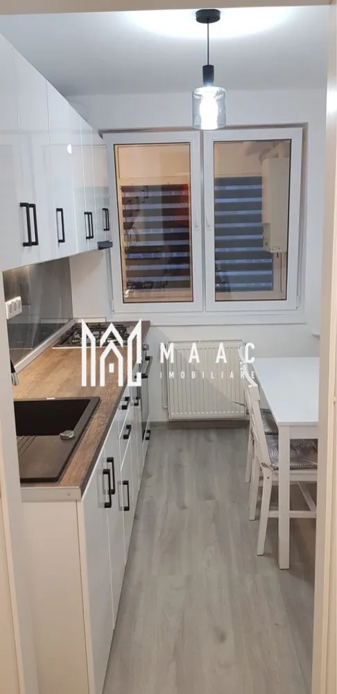 Apartament 2 Camere | 63Mp | Zona Mihai Viteazul - MAAC Imobiliare vă propune spre închiriere un apartament decomandat, cu o suprafață de 63 mp, situat la etajul 6 din 10 al unui imobil modern. Detalii și avantaje: Suprafață: 63 mp Balcon luminos cu vedere frumoasă asupra orașului Aer condiționat Finisaje de calitate superioară, design interior modern Prima închiriere – totul este nou și pregătit pentru viitorul chiriaș Fără animale de companie Locație excelentă: Apartamentul se află într-o zonă bine conectată, aproape de centre comerciale, restaurante și zone de recreere. În apropiere se află Universitatea "Lucian Blaga", instituții de învățământ și parcuri ideale pentru relaxare. Transportul public este ușor accesibil, oferind conexiuni rapide către principalele puncte de interes din oraș. Apartamentul oferă confort, lumină naturală și un ambient primitor — alegerea ideală pentru cei care caută un cămin modern și elegant. Pentru mai multe detalii sau pentru a programa o vizionare, vă rugăm să ne contactați menționând ID:CP2813289