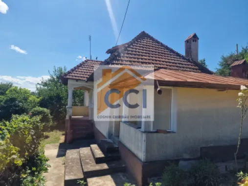Casa in mediu rural cu teren