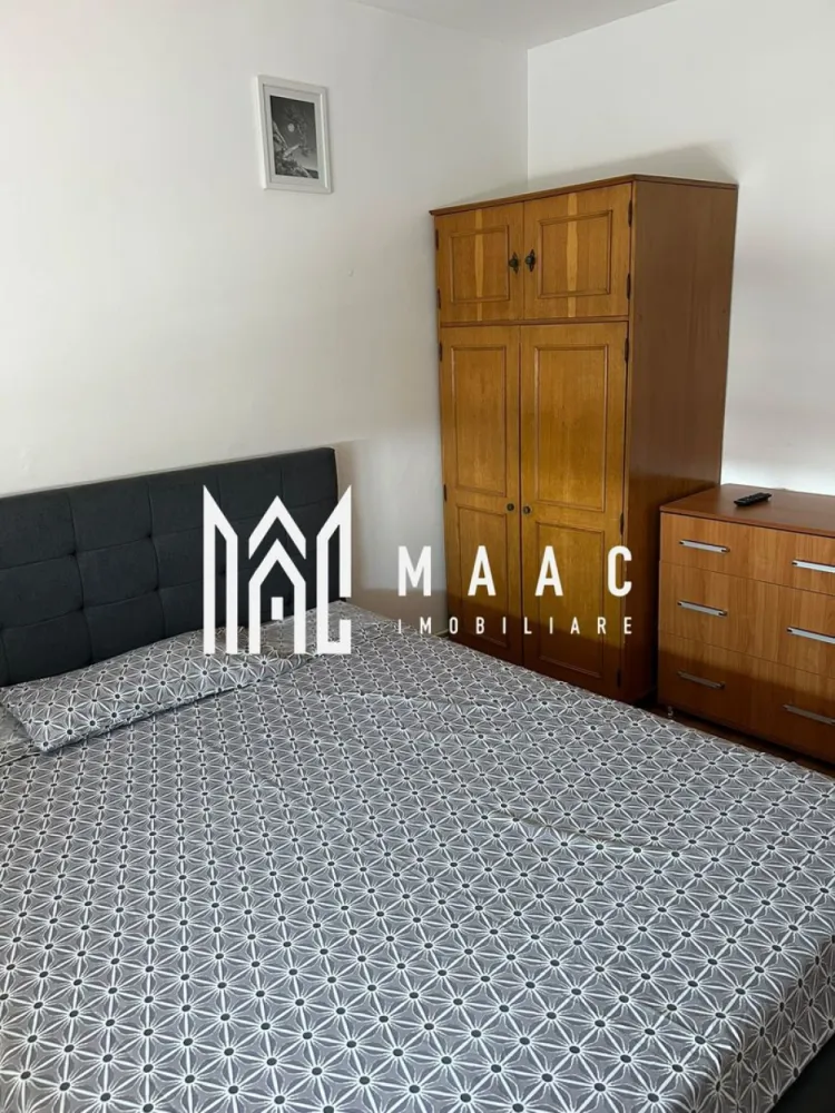 Apartamente de închiriat Sibiu | Terezian | 2 camere, 2 balcoane - Apartamente de închiriat Sibiu: locuința aceasta cu 2 camere din Terezian oferă 50 mp utili, două balcoane și bucătărie închisă, fiind o opțiune practică pentru locuire pe termen lung.

Detalii proprietate:
• Suprafață utilă: 50 mp
• Suprafață construită: 64 mp
• 2 camere, 1 dormitor, 1 baie, 1 bucătărie
• Două balcoane
• Stare interioară: bună
• An construcție: 1980
• Bucătărie închisă, complet mobilată și utilată
• Compartimentarea din descriere include living, dormitor, baie, hol și două balcoane

Zona Terezian oferă acces rapid către centrul orașului și către zonele comerciale importante. În apropiere se regăsesc școli, grădinițe, magazine, supermarketuri, farmacii și stații pentru transportul în comun, utile pentru un stil de viață comod în Sibiu.

Pentru detalii suplimentare și programarea unei vizionări, contactați echipa MAAC Imobiliare și menționați Cod anunț CP3214154.

Conținut optimizat cu AI, aprobat de agent uman.