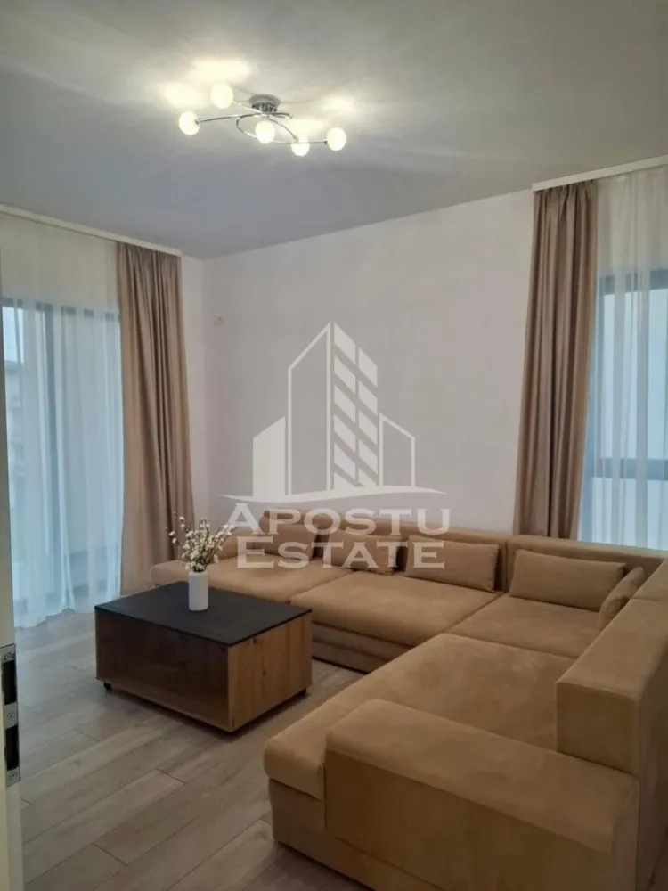 Apartament 2 camere de inchiriat, Giroc, Timisoara - Agentia imobiliara APOSTU ESTATE va propune spre inchiriere un apartament cu 2 camere, spatios si luminos, situat in zona Giroc, o zona linistita si bine pozitionata din Timisoara, potrivit pentru cupluri,familii, sau studenti care isi doresc o locuinta unde sa se simta confortabil si cu acces facil catre statii de autobuz, supermarketuri , magazine de zona, parcuri.

Suprafata utila: 52 mp
Compartimentare eficienta:
-Hol de acces generos
-Bucatarie complet mobilata si utilata, cu loc de luat masa
-Living luminos si spatios
-Dormitor mobilat si utilat
-Baie prevazuta cu cada
-Apartamentul este la prima inchiriere,totul fiind nou

Confort si facilitati:
-Incalzirea apartamentului: centrala proprie
-Incalzire prin pardoseala
-Apartamentul este complet mobilat si utilat
-Se accepta animale de companie de catre proprietar, dar cu anumite conditii

Localizare:
-Timis,Timisoara, zona Giroc – acces facil spre magazine, supermarketuri, scoli, parcuri si mijloace de transport in comun.

Ideal pentru:
-Familii
-Cupluri
-Studenti

Disponibilitate: imediata
Pret chirie lunara: 500
Programeaza o vizionare pentru a-ti putea imagina viitorul aici!
ID intern: CP3218081
