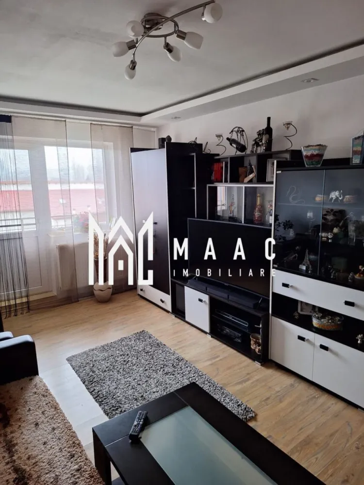 Apartament 3 camere | Complet mobilat și utilat | 2 balcoane - MAAC Imobiliare vă propune spre vânzare un apartament cu 3 camere, situat la etajul 4, într-un imobil cu doar 2 apartamente pe nivel, ceea ce oferă mai multă liniște și intimitate.

Locuința se vinde complet mobilată și utilată, fiind pregătită pentru mutare imediată.

Compartimentare și caracteristici
 • living spațios
 • 2 dormitoare
 • bucătărie complet utilată
 • baie dotată atât cu cadă, cât și cu cabină de duș
 • 2 balcoane, unul orientat spre est, celălalt spre vest, oferind lumină naturală pe tot parcursul zilei

Dotări și îmbunătățiri
 • aer condiționat
 • centrală termică proprie
 • mașină de spălat vase
 • mașină de spălat rufe
 • uscător de rufe
 • combină frigorifică și congelator
 • plită electrică și pe gaz
 • cuptor și hotă

Apartamentul beneficiază de izolație atât la interior, cât și la exterior, inclusiv tavanul și pardoseala, ceea ce contribuie la un confort termic ridicat și costuri reduse de întreținere.

De asemenea, instalațiile electrice și sanitare au fost schimbate integral, oferind siguranță și funcționalitate pe termen lung.

Pentru mai multe detalii sau pentru programarea unei vizionări, vă rugăm să ne contactați și să menționați ID-ul proprietății: CP2972355.