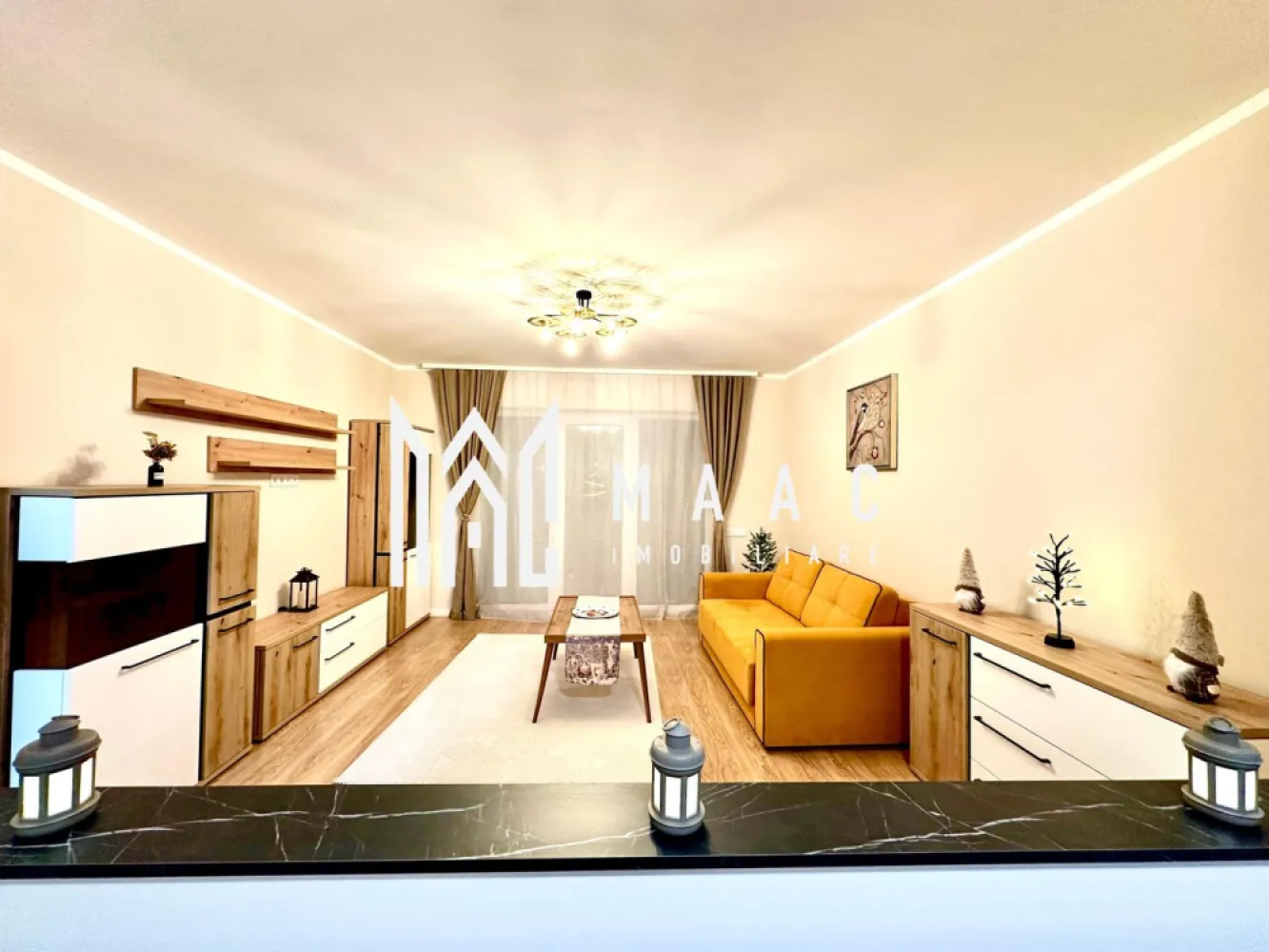 Apartament de vanzare Sibiu 2 camere | Exterior Vest | 54 mp, INTABULAT - Apartament de vânzare în Sibiu, în zona Exterior Vest - Cartierul DaVinci, cu 2 camere decomandate, 54 mp utili, balcon și loc de parcare, finalizat și pregătit pentru locuire.

Detalii proprietate:
• Suprafață utilă de 54 mp și suprafață construită de 64 mp
• Compartimentare decomandată: living, dormitor, bucătărie separată, baie și balcon finisat complet
• Parter într-un imobil cu 2 niveluri, finalizat în 2023
• Finisaje moderne, încălzire în pardoseală și izolație cu vată bazaltică
• Jaluzele electrice, orientare sudică și 1 loc de parcare inclus
• Apartamentul se predă mobilat și utilat, cu contoare funcționale
• Vila are doar 12 apartamente, oferind un cadru mai aerisit și liniștit

Cartierul DaVinci oferă acces rapid către Zona Industrială Vest, Aeroportul Internațional Sibiu și magazinul Metro, iar Centrul Istoric al Sibiului este la aproximativ 15 minute. Zona include spații verzi generoase și deschidere către priveliște spre munți.

Cod anunț CP2465336. Contactați echipa MAAC Imobiliare pentru detalii suplimentare și pentru programarea unei vizionări.