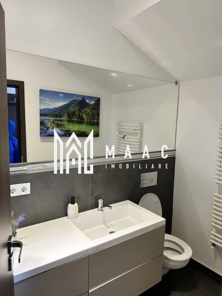 Casă insiruita 4 camere | 150 mpu | Selimbar - MAAC Imobiliare vă propune spre vânzare o casă intr-o zonă liniștită din Șelimbăr construită în 2016, pe un teren de 318 mp. Proprietatea oferă aproximativ 150 mp utili, distribuiți pe parter și etaj.

La parter regăsim holul, o baie, dressingul, bucătăria și livingul open-space, precum și terasa exterioară. Etajul este format din trei camere, fiecare cu balcon, două băi și un hol.

Curtea este amenajată, dispune de garaj și patru locuri de parcare, iar întreaga proprietate este împrejmuită și dotată cu poartă pietonală și auto. Casa se predă la cheie, cu toate utilitățile disponibile.

Pentru mai multe detalii, vă rugăm sa ne contactați, specificand ID: CP2809096