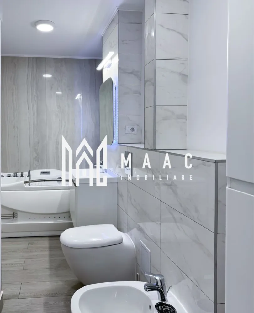 Apartament 4 camere | Nord | centrală | - MAAC IMOBILIARE vă propune spre vânzare un apartament spațios cu 4 camere, situat în Zona Nord – Râmnicu Vâlcea, una dintre cele mai apreciate și bine cotate zone ale orașului.
Acest imobil impresionează prin suprafața generoasă, compartimentarea inteligentă și confortul oferit, fiind alegerea ideală pentru o familie care își dorește un cămin modern, bine organizat și poziționat excelent.
Localizare premium: Apartamentul este amplasat într-o zonă cu acces facil către toate punctele de interes: supermarketuri, magazine, școli, licee, biserică și mijloace de transport, oferind un stil de viață comod și echilibrat.
Detalii tehnice:
Suprafață utilă: 90,24 mp
Suprafață totală: 96,7 mp
Compartimentare: decomandat – 4 camere
Etaj: 4 din 5
2 balcoane (unul închis, unul deschis)
2 băi
Bucătărie open-space (poate fi utilizată și ca living)
Debara pentru depozitare eficientă
Compartimentare inteligentă:
Dormitor matrimonial, compus din dormitor, dressing generos și baie proprie cu cadă
Cameră secundară ideală pentru copil sau oaspeți, cu balcon închis
Living spațios (sau al treilea dormitor), cu acces către balcon deschis
Baie secundară poziționată pe hol
Avantaje și dotări:
-Apartament renovat complet în urmă cu 2 ani
-Centrală termică proprie pe gaz
-2 aparate de aer condiționat
-Scară curată și liniștită, cu vecini civilizați
Compartimentare practică și luminozitate excelentă
Se vinde parțial mobilat:
-Mobilier bucătărie inclus
-Dressing complet utilat
-Băile rămân complet mobilate și echipate
Un apartament ideal pentru cei care caută spațiu, confort și o locație excelentă!
Pentru mai multe detalii sau programarea unei vizionări, echipa MAAC IMOBILIARE vă stă cu drag la dispoziție!