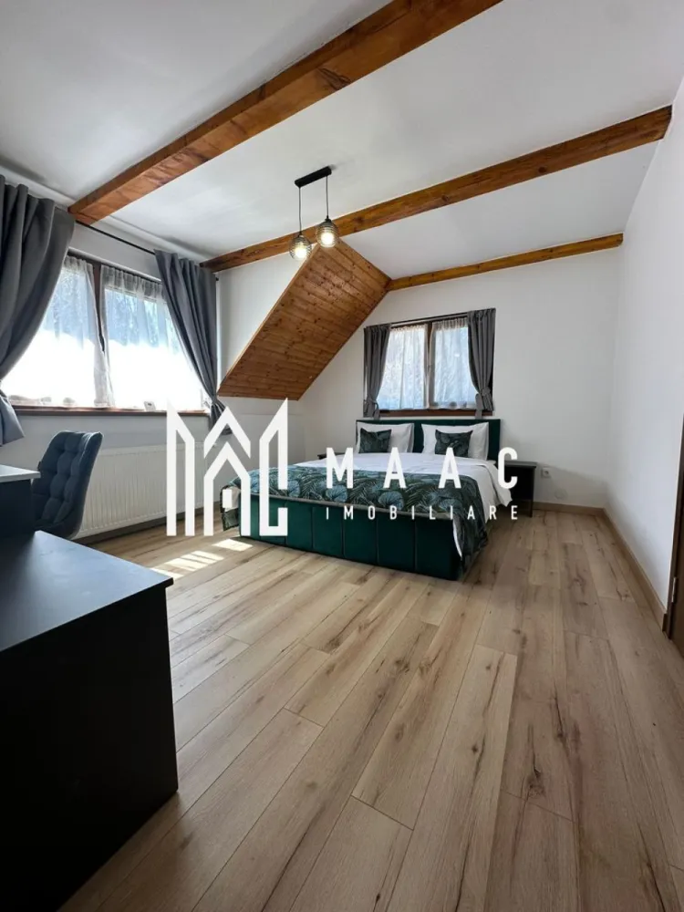 Casa de vacanta I 200 mp I Teren 1000 mp I Valea Avrigului - MAAC Imobiliare vă propune spre vânzare o casă de vacanță deosebită, situată într-o zonă liniștită și pitorească, pe Valea Avrigului, ideală atât pentru relaxare, cât și pentru investiție.

Proprietatea dispune de 7 camere, dintre care 5 dormitoare spațioase cu baie proprie,7 băi total ,fiind perfect compartimentată pentru confortul unei familii numeroase sau pentru a fi exploatată în regim turistic. Mansarda open space oferă un spațiu generos si este in plus fata de metri patrati utili,ideal pentru zonă de relaxare sau activități recreative, iar pivnița adaugă un plus de utilitate proprietății.Filigorie de 60 mp

Casa este amenajată cu bun gust, la standarde de lux, și se vinde complet mobilată și utilată, fiind pregătită pentru mutare imediată. În exterior, regăsim un spațiu special amenajat pentru barbecue și o magazie pentru depozitare, completând perfect funcționalitatea proprietății.

Imobilul este racordat la utilități, beneficiind de curent electric, apă, fosă septică și o centrală performantă pe peleți, care asigură un confort termic ridicat și eficiență energetică.
Casa dispune de Panouri Solare de 6 kw + Baterie de 5 KW

Datorită poziționării excelente într-o zonă turistică apreciată, această proprietate este ideală ca locuință de vacanță, reședință permanentă sau poate fi transformată cu ușurință într-o pensiune, oferind un potențial investițional ridicat

Pentru mai multe detalii precizati ca ati vazut anuntul cu ID CP3019257