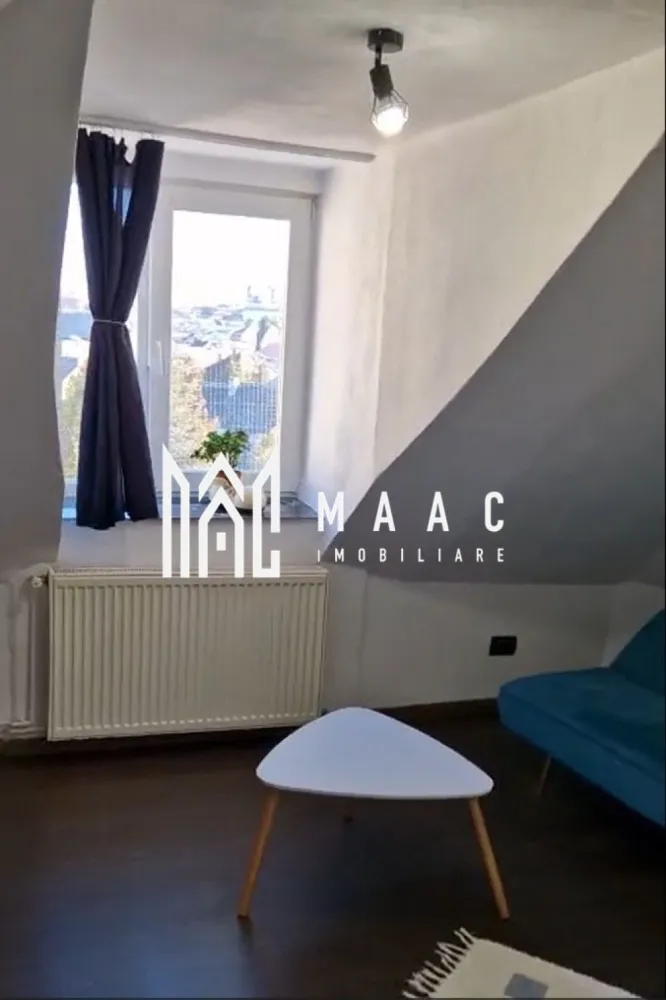 Apartament 2 camere I Etaj 2 I 51 mpu I Investitie I Piata Cluj - MAAC Imobiliare oferă spre vânzare un apartament situat la mansarda unei case cu un etaj, amplasată în zona căutată Piața Cluj. Locuința are o suprafață utilă de 51 mp și este organizată într-un mod practic, ideal atât pentru locuire, cât și pentru investiție.

Apartamentul este structurat astfel:

living
dormitor
bucătărie
baie
debara
hol de acces

Mansardarea este realizată cu lucarne, ceea ce optimizează spațiul interior și asigură un aport generos de lumină naturală.

Dotări:
izolație exterioară
centrală termică
certificat energetic – clasa C
se vinde mobilat și utilat

Proprietatea este în prezent închiriată, cu un contract activ de 340 euro/lună, ceea ce o transformă într-o investiție imediat rentabilă.

Zona Piața Cluj este bine cotată, cu acces rapid către puncte de interes, transport și facilități urbane.

Pentru mai multe detalii contactați MAAC Imobiliare specificând ID CP3010101.