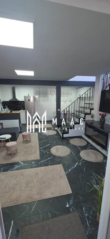 Casa individuala | 4 camere | Acces auto | Selimbar - MAAC Imobiliare vă propune spre vânzare o casă individuală recent renovată, situată într-o zonă liniștită din Șelimbăr, ideală pentru o familie care își dorește confort, intimitate și un spațiu modern gata de locuit.

Proprietatea, construită în urmă cu doar 5 ani, are o suprafață utilă de 91 mp și este amplasată pe un teren de 130 mp, cu o amprentă la sol de 60 mp și curte liberă de aproximativ 70 mp.

Casa este izolată termic și se vinde complet mobilată și utilată, oferind viitorilor proprietari posibilitatea de a se muta imediat, fără investiții suplimentare.

Dotări și beneficii:

Izolație exterioară completă;

Finisaje moderne, recent renovate integral;

Curte amenajată cu grătar și acces auto;

Mobilier și electrocasnice incluse în preț;

Locație excelentă, cu acces rapid către Sibiu și principalele puncte de interes din Șelimbăr.

Această proprietate reprezintă alegerea perfectă pentru cei care caută o casă individuală, modernă, complet amenajată și pregătită pentru mutare imediată.

Pentru detalii suplimentare și programarea unei vizionări, contactați echipa MAAC Imobiliare.
ID: CP2804407.