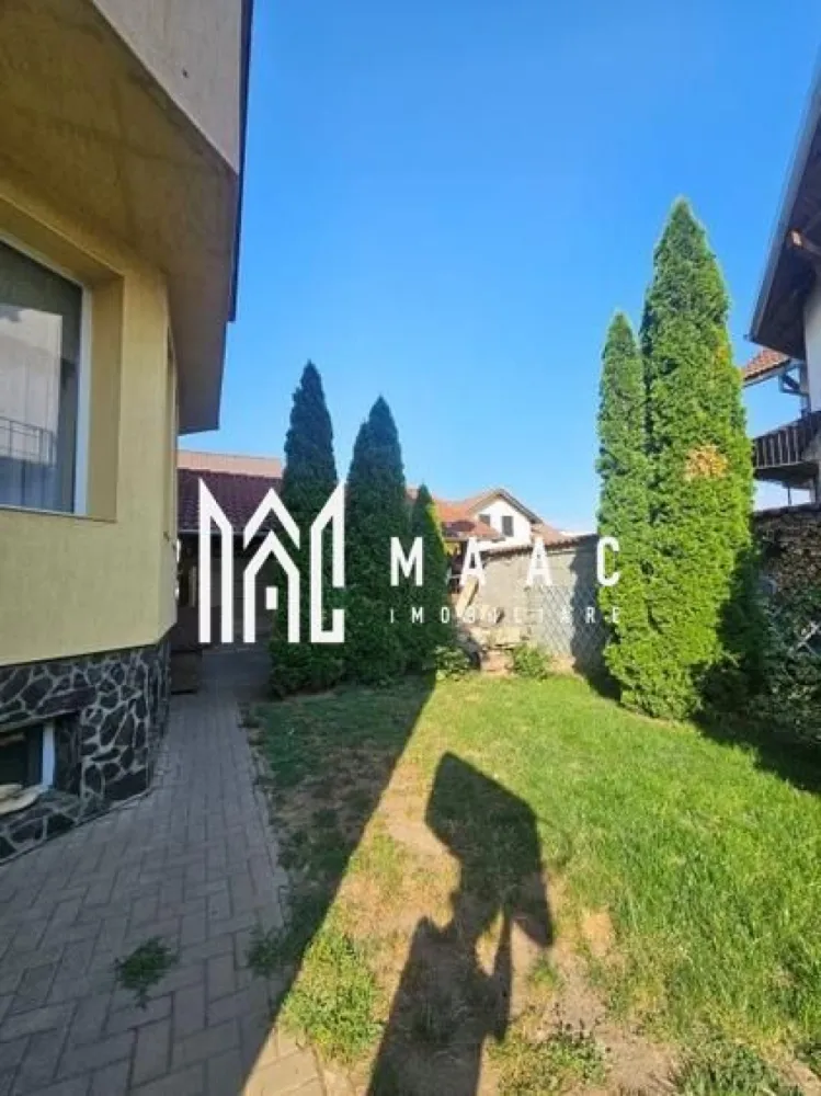 Casa 8 camere | 308mpu | 2 Apartamente | Selimbar - MAAC IMOBILIARE propune atentiei dumneavoastra o casa spatioasa, pentru două familii, două generații sau dublă investiție - casă și birou, într-o zonă premium din Șelimbăr.

Imobilul cuprinde două apartamente complet funcționale, cu acces separat și dotări generoase, într-un imobil construit responsabil.
Casa a fost finalizată în 2009, pe structură durabilă: cărămidă Porotherm 30 cm, termosistem de 10 cm, fațadă Knauf, țiglă din beton, panouri solare pentru încălzirea apei, centrală termică in condensatie Junkers de 42Kw + boiler Junkers cu o capacitate de 300 litrii, încălzire în pardoseală și calorifere, sistem de drenaj și trotuare pavate.
Apartamentul 1 – generos, cu o suprafață utilă de 128.4mpu
• Parter: birou, living cu șemineu, zonă de dining, bucătărie, baie de serviciu (suprafață utilă de 64,10 mp)
• Mansardă: 3 dormitoare, dressing, baie, acces la pod prin scară pliantă, (suprafață utilă de 64.10 mp) cu aer condiționat
• Exterior: 2 locuri de parcare într-un garaj aerisit și acoperit, foișor complet echipat (grătar, cuptor ,plită, toate cu funcționalitate pe lemne), magazine de depozitare unelte gradinărit
Apartamentul 2 – cu o suprafață utilă de 72.5mpu
• Parter: living cu șemineu, dining, bucătărie, baie de serviciu (suprafață utilă de 36,40 mp)
• Mansardă: 2 dormitoare, baie, acces la pod, aer condiționat (suprafață utilă de 36,10 mp)
• Exterior: 1 loc de parcare într-un garaj aerisit și acoperit, foișor cu grătar și loc de relaxare

Demisolul - 108 mpu - comunică prin două holuri comune.

Aflat pe o stradă liniștită, asfaltată și iluminată public, imobilul este situat la doar 400 m de Shopping City Sibiu, DN1, Lidl și Kaufland Șelimbăr și la 4 km de centrul istoric al Sibiului, cu acces rapid și spre autostradă.

Pentru mai multe detalii precizati telefonic ca ati vazut anuntul cu ID CP2803211