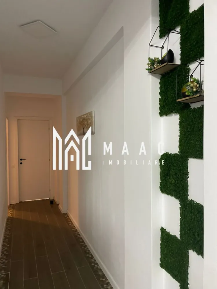 Apartament 2 Camere | Decomandat | Loc de parcare | O.Goga - MAAC Imobiliare vă propune spre vânzare un apartament modern cu 2 camere, complet mobilat și utilat, cu finisaje contemporane, situat într-o zonă liniștită, ideal pentru locuire proprie sau investiție.

Apartamentul este luminos și primitor, evidențiindu-se prin amenajarea modernă, spațiile aerisite și mobilierul nou, ales pentru funcționalitate și confort. Compartimentarea este practică și eficientă, adaptată unui stil de viață urban.

Caracteristici principale:
-living spațios
-dormitor confortabil
-bucătărie complet echipată
-baie complet utilată
-complet mobilat: canapea extensibilă, pat matrimonial, masă de dining, dulapuri spațioase
-electrocasnice noi: frigider, mașină de spălat, cuptor, plită, centrală termică proprie
-pardoseală din gresie tip parchet și laminat
-geamuri termopan
-iluminat LED modern

Locuința este gata pentru mutare imediată, fiind potrivită pentru o persoană sau un cuplu care își dorește confort, liniște și un apartament amenajat într-un stil modern.

Pentru mai multe detalii și programarea unei vizionări, vă rugăm să menționați numărul CP2795836 la telefon.