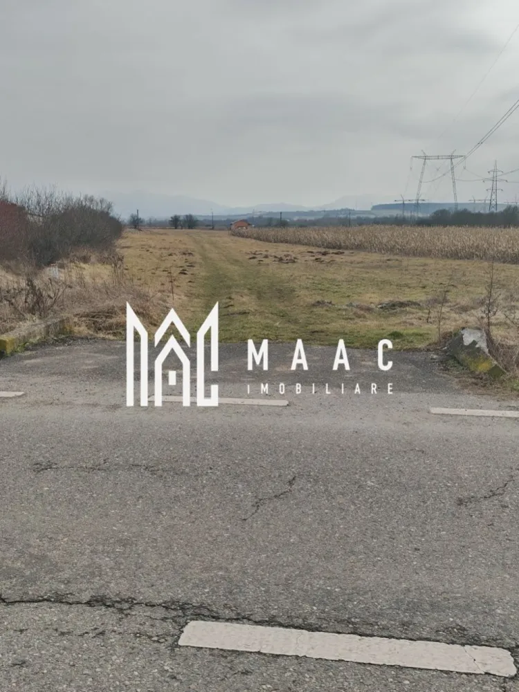 Teren 2.600mp | Extravilan | Mohu - MAAC Imobiliare vă propune spre vânzare un teren extravilan situat în Mohu, județul Sibiu, cu acces direct din drumul principal.

Terenul are o suprafață totală de 2.600 mp, cu o deschidere la stradă de 20 m și o lungime de aproximativ 130 m, oferind un front generos și multiple posibilități de utilizare.

Caracteristici:
Acces direct din drum principal
Acces auto foarte bun
Utilități în apropiere (curent, gaz)
Zonă liniștită
Potențial bun pentru investiție
Acte în regulă
 Pentru mai multe detalii specificati ca ati vazut anuntul cu ID:CP2914296