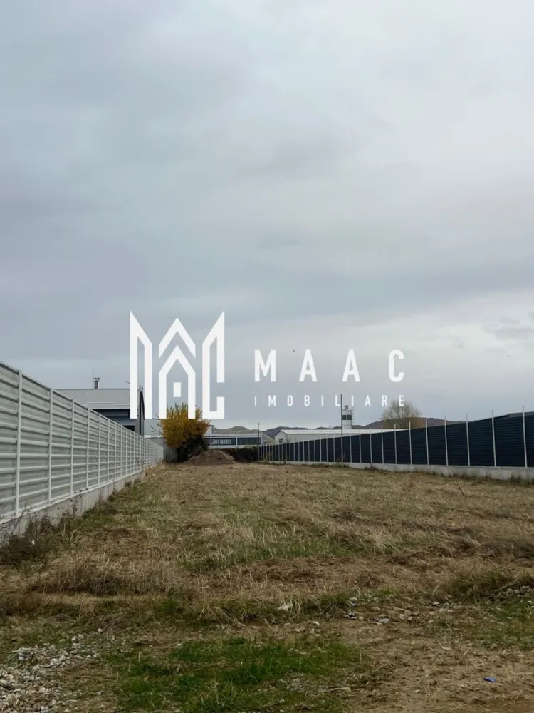 Teren | Budesti | Zona industriala - TERENURI INDUSTRIALE – BUDEȘTI, ZONA INDUSTRIALĂ – MAAC IMOBILIARE

MAAC Imobiliare vă propune spre vânzare două terenuri situate în zona industrială a localității Budești, la doar 300 de metri de strada principală, ideale pentru dezvoltări comerciale sau industriale.

Caracteristici principale:

* Suprafață teren 1: 1.850 mp
* Suprafață teren 2: 1.750 mp
* Deschidere: 17 metri liniari la drum pentru fiecare parcelă
* Acces facil pentru camioane și utilaje
* Utilități disponibile în zonă
* Drum de acces bun, aproape de artera principală

Destinație și potențial:

Terenurile sunt pretabile pentru construcția de hale industriale, spații de depozitare, ateliere sau alte activități economice.
Zona este în plină dezvoltare, oferind multiple oportunități de investiție.

Preț:

82000 EURO / parcelă

Contact MAAC Imobiliare pentru detalii suplimentare, vizionare sau consultanță privind achiziția.

Aceste terenuri reprezintă o investiție ideală pentru dezvoltatori sau antreprenori care caută o locație accesibilă și funcțională în zona industrială Budești, specificand ID: CP2802354