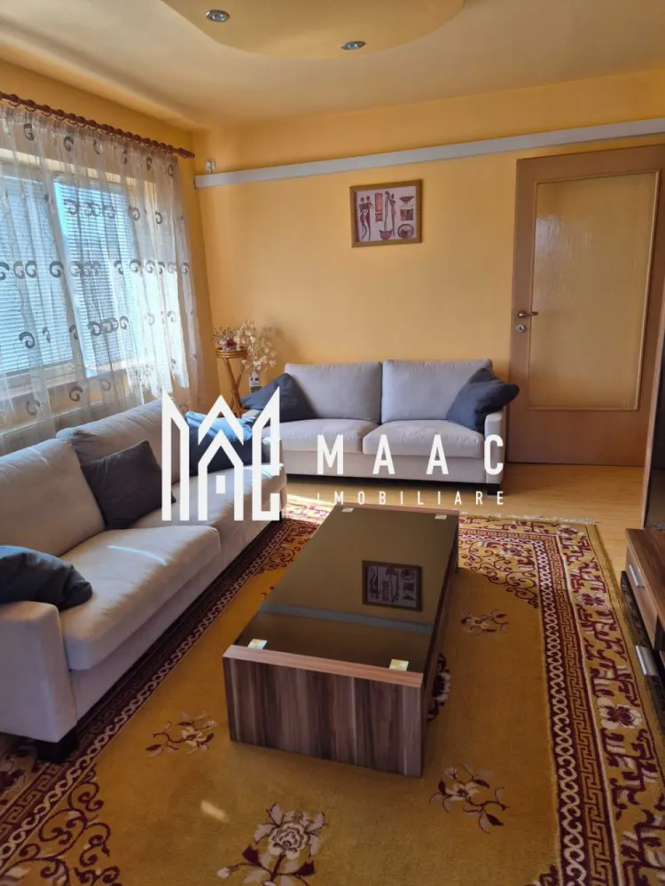 Apartament 3 Camere I Decomandat I Etaj 1 I Trei Stejari - Va propunem spre vanzare un apartament de 3 camere decomandat situat la etajul 1/2 din zona Trei Stejari. 

Dacă ești în căutarea unui apartament complet mobilat și utilat, bine compartimentat și într-o zonă liniștită din Sibiu, această proprietate din Trei Stejari poate fi alegerea potrivită.

Detalii apartament:
 • Suprafață utilă: 65 mp
 • 2 dormitoare spațioase și luminoase
 • Living generos, perfect pentru relaxare sau petrecerea timpului cu familia
 • Bucătărie separată, complet utilată (frigider, aragaz, cuptor, mașină de spălat)
 • Baie cu fereastră, dotată cu toate cele necesare
 • Balcon, ideal pentru momente de relaxare
 • Loc de parcare în curtea blocului
 • Se vinde complet mobilat și utilat – tot ce ai nevoie pentru mutare imediată

Avantaje importante:
 • Apartamentul este situat într-o zonă liniștită, cu acces rapid la centrul orașului, Parcul Sub Arini, școli, grădinițe, magazine și transport public
 • Bloc îngrijit, cu vecini civilizați
 • Ideal pentru locuit sau pentru investiție (închiriere pe termen lung sau regim hotelier)

Pentru mai multe detalii sau pentru a programa o vizionare ID: CP2526304