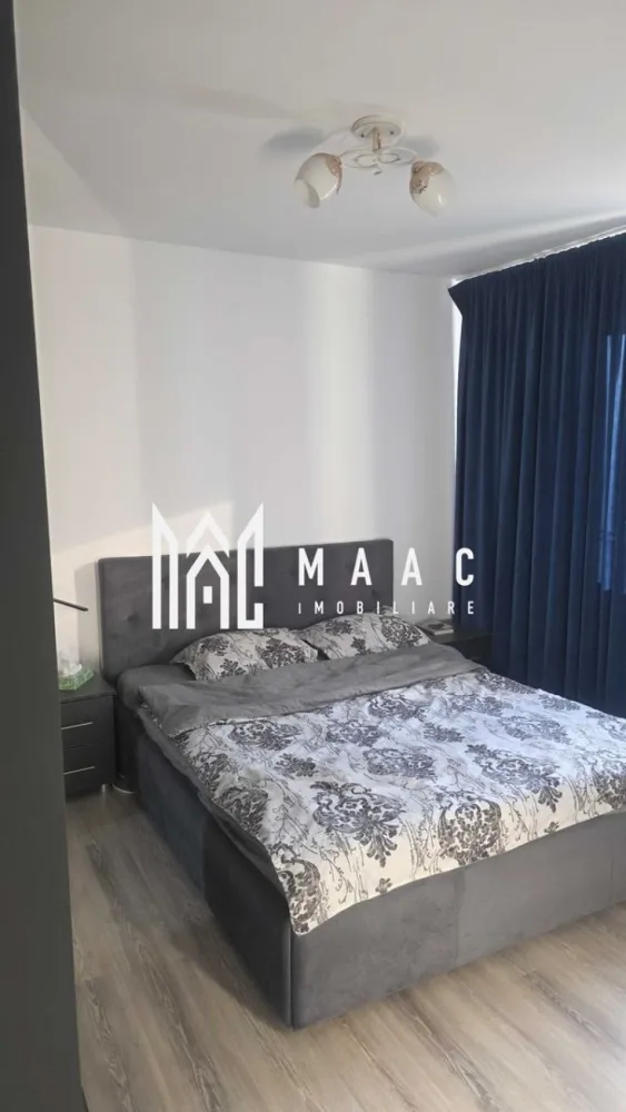 Apartament 2 camere | Prima închiriere | Etaj 3 | Balcon | Cedonia - MAAC Imobiliare vă propune spre închiriere un apartament modern cu 2 camere, aflat la prima închiriere, situat în cartierul Cedonia, într-o zonă apreciată pentru accesul rapid către toate punctele de interes ale orașului.

Apartamentul are o suprafață utilă de 48 mp, este amplasat într-un bloc cu lift și se închiriază complet mobilat și utilat, fiind pregătit pentru mutare imediată.

Compartimentare
Living luminos
Dormitor
Bucătărie
Baie
Balcon
2 debarale / spații de depozitare
Dotări
Centrală termică proprie
Lift
Bucătărie complet mobilată și utilată
Plită și cuptor
Frigider
Mașină de spălat vase
Cuptor cu microunde
Mașină de spălat rufe
Smart TV
Mobilier complet
Avantaje
Prima închiriere
Balcon
Două spații de depozitare
Disponibil imediat
Ideal pentru o persoană sau un cuplu
Avantaje locație
Profi Non-Stop chiar lângă bloc
Stații de autobuz la câțiva pași
Farmacii și magazine în apropiere
Școli și grădinițe
Acces rapid către centrul orașului, Promenada Mall și principalele zone de interes din Sibiu

Pentru mai multe detalii precizati telefonic ca ati vazut anuntul cu ID: CP3215863