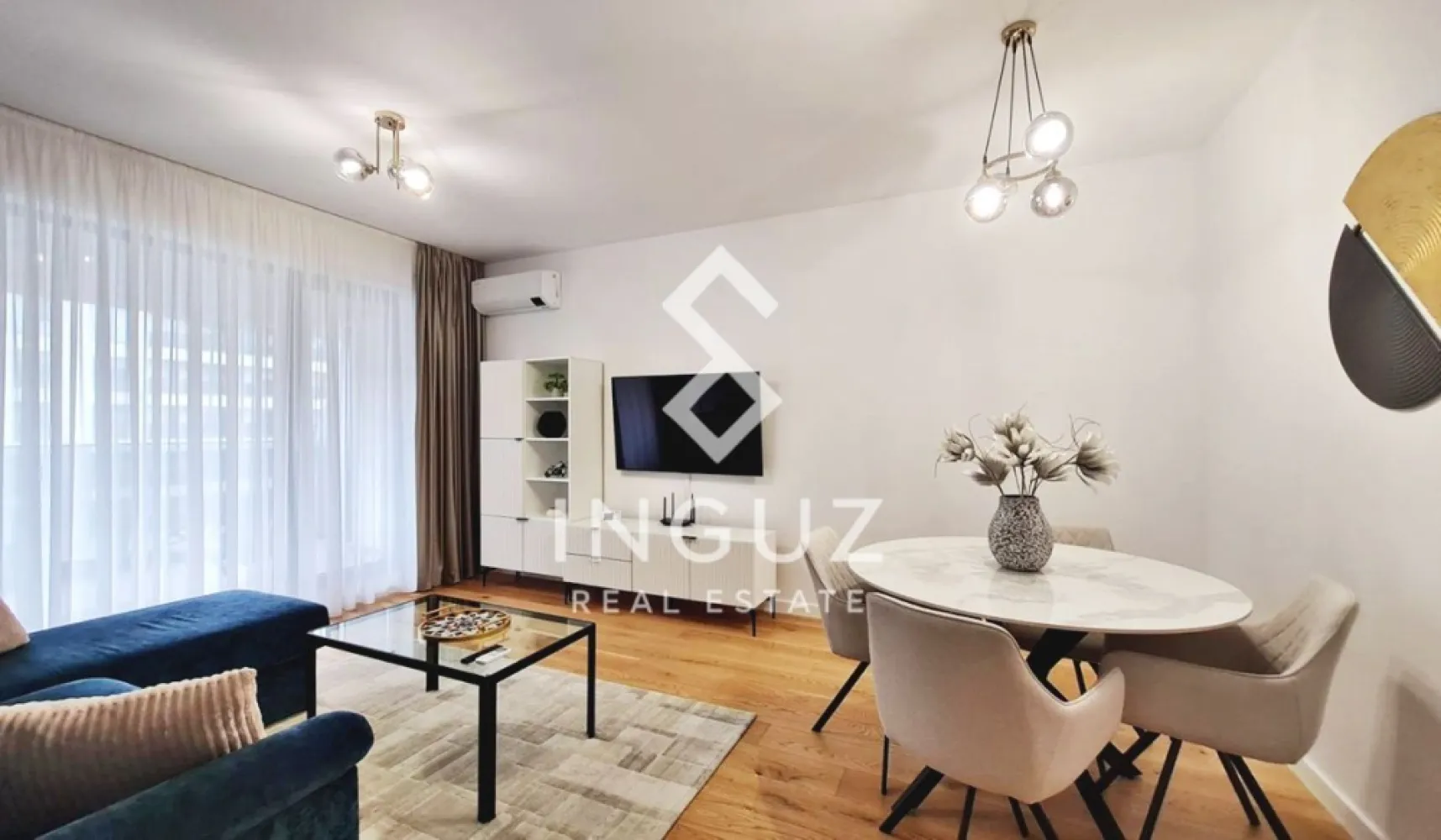 Apartament 3 camere de închiriat | Nusco City – Promenada Mall | Aviaț - Apartament 3 camere de închiriat | Nusco City – Promenada Mall | Aviației

Preț: 1.700 EUR

Apartament modern cu 3 camere, situat în complexul rezidențial Nusco City, una dintre cele mai căutate zone din nordul Bucureștiului, la doar câteva minute de Promenada Mall și principalele centre de business.

Detalii proprietate:
• Suprafață utilă: 90 mp
• Compartimentare decomandată
• Etaj 5 din 7
• Construcție 2023
• 2 băi | terasă generoasă

Compartimentare:
• Living spațios cu acces la terasă
• Bucătărie complet mobilată și utilată
• 2 dormitoare confortabile
• 2 băi moderne
• Terasă accesibilă din living și bucătărie

Dotări:
• Complet mobilat în stil modern
• Electrocasnice de ultimă generație
• Aer condiționat în fiecare cameră
• Finisaje premium

Facilități:
• Loc de parcare suprateran inclus
• Interfon și 2 lifturi
• Acces securizat și supraveghere video
• Spații verzi și zone pentru copii

Localizare:
• 5 minute de Promenada Mall
• Aproape de zona de business (Aviației, Pipera)
• Acces rapid către transport și puncte de interes

Informații suplimentare:
• Apartament ideal pentru rezidență premium sau expați
• Complex nou, foarte bine întreținut