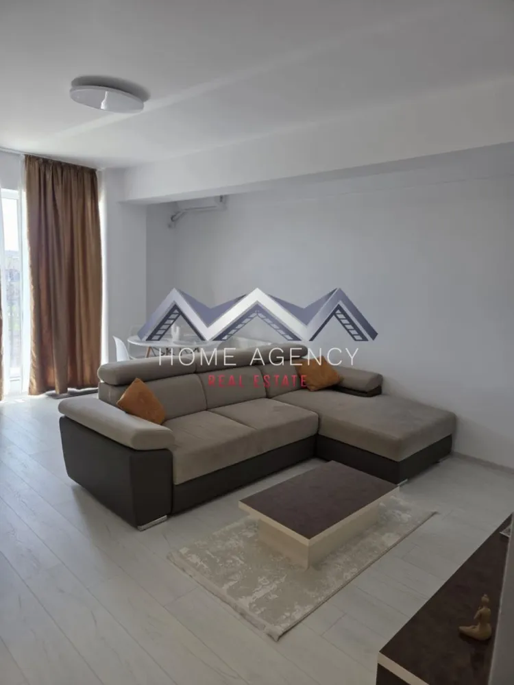 Apartament 2 camere Otopeni | prima închiriere | include parcare - Dacă îți dorești un apartament modern, luminos și aflat la prima închiriere, această proprietate poate fi alegerea ideală pentru tine!

Acest apartament cu 2 camere este situat într-o zonă liniștită și accesibilă din Otopeni, cu legături rapide către București și principalele puncte de interes din zonă. Poziționat la etajul 1 din 3, locuința oferă un echilibru excelent între confort și funcționalitate.

Zona de zi este organizată sub forma unui open-space cu bucătăria și locul de luat masa, creând un spațiu aerisit și bine luminat natural, cu acces spre balcon. Dormitorul este luminos și confortabil, ideal pentru odihnă, iar baia modernă, dotată cu duș walk-in, completează funcționalitatea locuinței. De asemenea, proprietatea beneficiază de loc de parcare dedicat.

📞 Programează o vizionare și descoperă dacă acest apartament este potrivit pentru tine!
