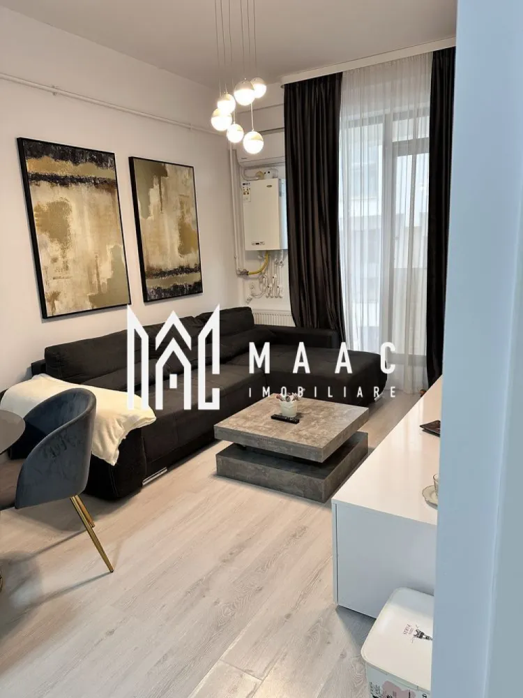 Apartament 2 camere| Finisat modern | Doamna Stanca - MAAC Imobiliare vă propune spre vânzare un apartament cu 2 camere, situat în ansamblul Azur Residence, pe strada Doamna Stanca, într-o zonă în continuă dezvoltare, ideală atât pentru locuire, cât și pentru investiție.

Locuința este amplasată la parter înalt într-un imobil finalizat în anul 2019 și beneficiază de o compartimentare modernă, adaptată stilului de viață actual.

Compartimentarea este eficientă și funcțională:
-bucătărie open space cu living
-dormitor
-baie cu duș

Apartamentul se vinde complet mobilat, cu finisaje de calitate și un design interior modern, oferind un ambient confortabil și echilibrat, pregătit pentru mutare imediată.

În prețul proprietății este inclus și un loc de parcare generos, de aproximativ 30 mp, înscris în cartea funciară.

Proprietatea reprezintă o oportunitate bună pentru investiție sau locuire, beneficiind de poziționare într-un ansamblu rezidențial modern, cu acces facil către puncte de interes urban.

Pentru mai multe detalii, vă rugăm să menționați telefonic că ați văzut anunțul cu CP2797631