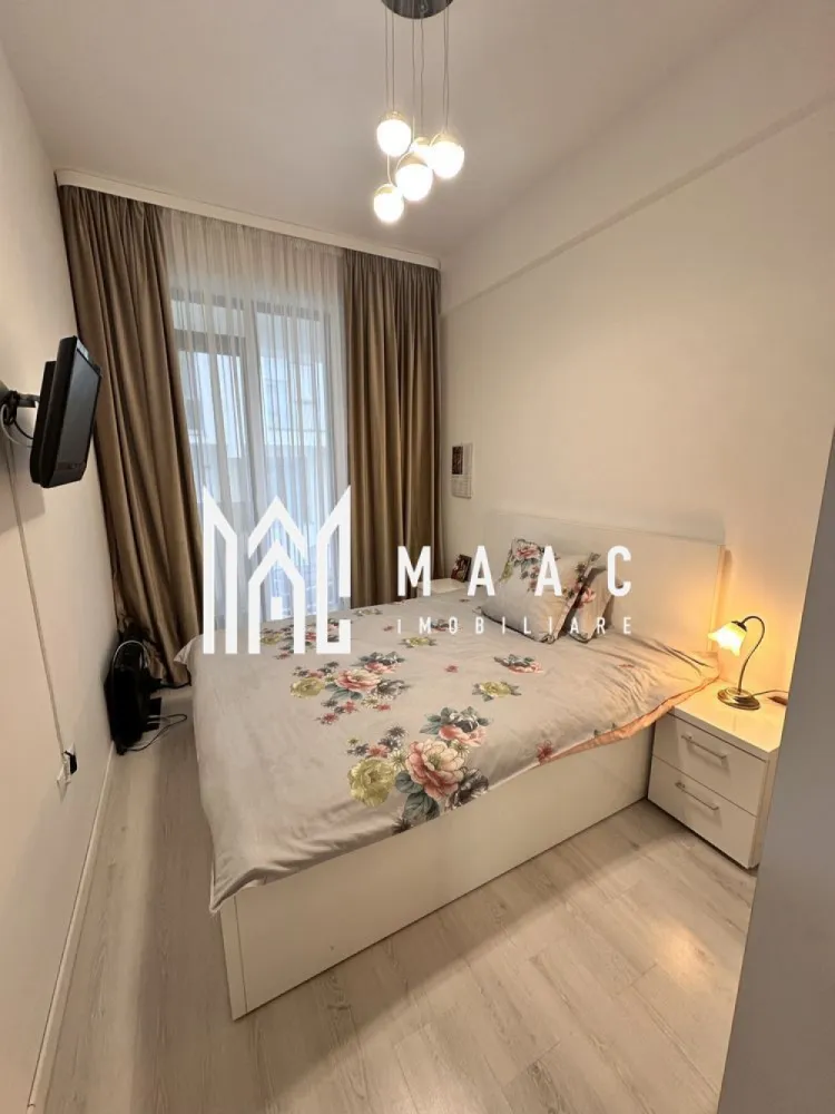 Apartament 2 camere| Finisat modern | Doamna Stanca - MAAC Imobiliare vă propune spre vânzare un apartament cu 2 camere, situat în ansamblul Azur Residence, pe strada Doamna Stanca, într-o zonă în continuă dezvoltare, ideală atât pentru locuire, cât și pentru investiție.

Locuința este amplasată la parter înalt într-un imobil finalizat în anul 2019 și beneficiază de o compartimentare modernă, adaptată stilului de viață actual.

Compartimentarea este eficientă și funcțională:
-bucătărie open space cu living
-dormitor
-baie cu duș

Apartamentul se vinde complet mobilat, cu finisaje de calitate și un design interior modern, oferind un ambient confortabil și echilibrat, pregătit pentru mutare imediată.

În prețul proprietății este inclus și un loc de parcare generos, de aproximativ 30 mp, înscris în cartea funciară.

Proprietatea reprezintă o oportunitate bună pentru investiție sau locuire, beneficiind de poziționare într-un ansamblu rezidențial modern, cu acces facil către puncte de interes urban.

Pentru mai multe detalii, vă rugăm să menționați telefonic că ați văzut anunțul cu CP2797631