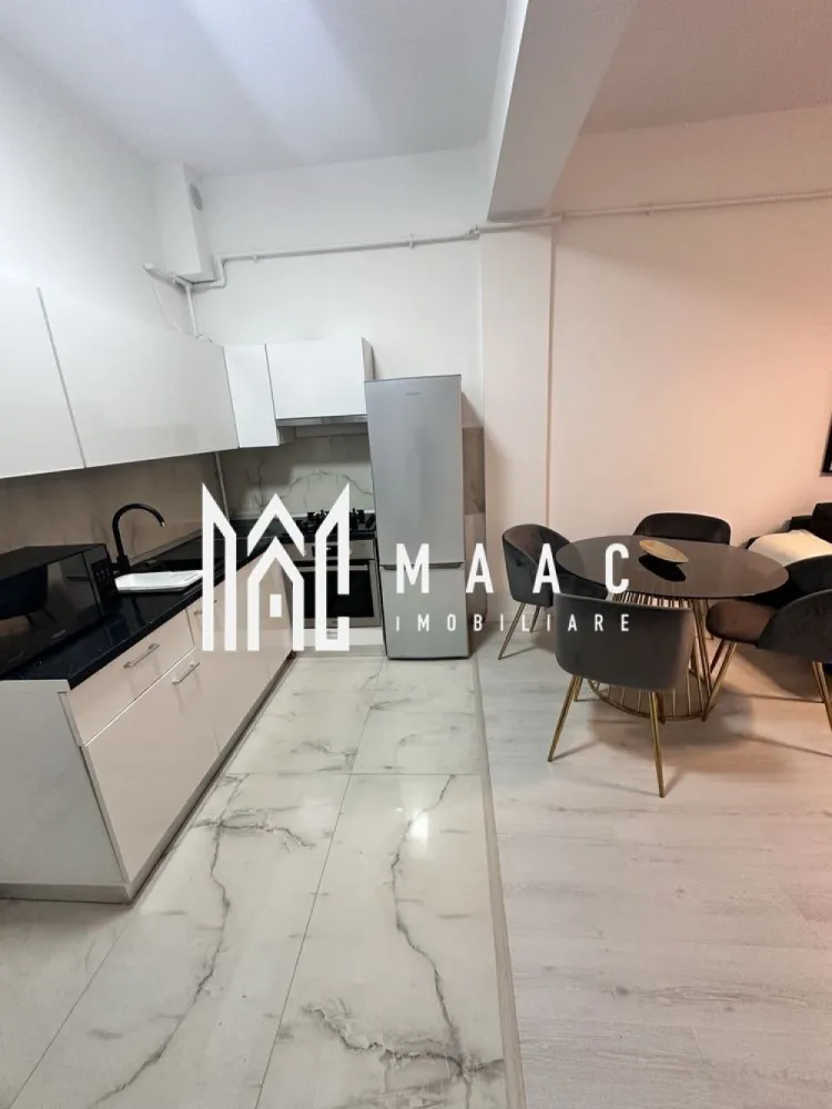 Apartament 2 camere| Finisat modern | Doamna Stanca - MAAC Imobiliare vă propune spre vânzare un apartament cu 2 camere, situat în ansamblul Azur Residence, pe strada Doamna Stanca, într-o zonă în continuă dezvoltare, ideală atât pentru locuire, cât și pentru investiție.

Locuința este amplasată la parter înalt într-un imobil finalizat în anul 2019 și beneficiază de o compartimentare modernă, adaptată stilului de viață actual.

Compartimentarea este eficientă și funcțională:
-bucătărie open space cu living
-dormitor
-baie cu duș

Apartamentul se vinde complet mobilat, cu finisaje de calitate și un design interior modern, oferind un ambient confortabil și echilibrat, pregătit pentru mutare imediată.

În prețul proprietății este inclus și un loc de parcare generos, de aproximativ 30 mp, înscris în cartea funciară.

Proprietatea reprezintă o oportunitate bună pentru investiție sau locuire, beneficiind de poziționare într-un ansamblu rezidențial modern, cu acces facil către puncte de interes urban.

Pentru mai multe detalii, vă rugăm să menționați telefonic că ați văzut anunțul cu CP2797631