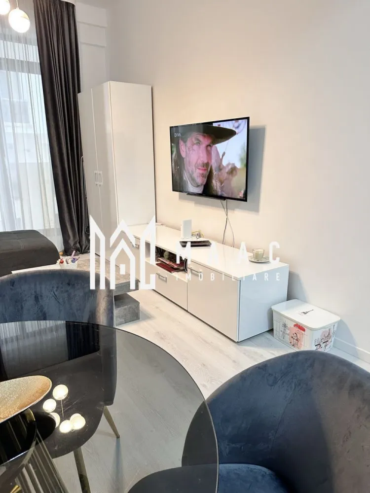 Apartament 2 camere| Finisat modern | Doamna Stanca - MAAC Imobiliare vă propune spre vânzare un apartament cu 2 camere, situat în ansamblul Azur Residence, pe strada Doamna Stanca, într-o zonă în continuă dezvoltare, ideală atât pentru locuire, cât și pentru investiție.

Locuința este amplasată la parter înalt într-un imobil finalizat în anul 2019 și beneficiază de o compartimentare modernă, adaptată stilului de viață actual.

Compartimentarea este eficientă și funcțională:
-bucătărie open space cu living
-dormitor
-baie cu duș

Apartamentul se vinde complet mobilat, cu finisaje de calitate și un design interior modern, oferind un ambient confortabil și echilibrat, pregătit pentru mutare imediată.

În prețul proprietății este inclus și un loc de parcare generos, de aproximativ 30 mp, înscris în cartea funciară.

Proprietatea reprezintă o oportunitate bună pentru investiție sau locuire, beneficiind de poziționare într-un ansamblu rezidențial modern, cu acces facil către puncte de interes urban.

Pentru mai multe detalii, vă rugăm să menționați telefonic că ați văzut anunțul cu CP2797631