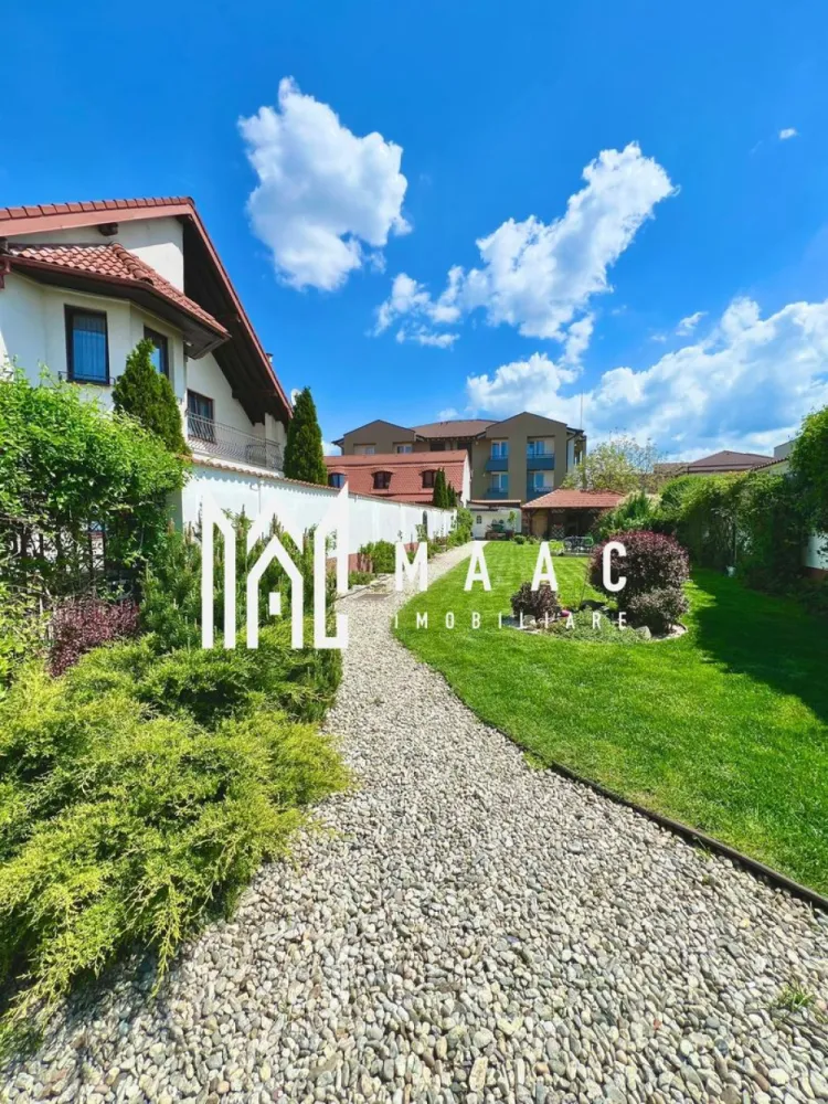 Casa individuala | 6 camere | Teren 863 MP | Selimbar - MAAC Imobiliare vă propune spre cumpărare o Casă/Vilă cu teren însumat de 863 mp.

Suprafață si Configurație corp principal :
Suprafață utilă: 155 mp
Structurată pe două niveluri: parter, mansardă (+pod amenajat)

Parterul oferă:
Bucătărie open space cu loc de servire a mesei în suprafață totală de 30 mp
Living cu ieșire la terasă
Baie cu duș
Birou sau cameră hobby
Spațiu de depozitare
Terasa acoperită perfecta pentru seri intime

Mansarda include :
Trei dormitoare ,unul matrimonial și două de copii
Baie cu cadă de hidromasaj

Pod amenajat utilizabil ca și loc de joacă sau dressing generos

Curte :
Garaj + carport
Terasă liberă
Curte pavată

Grădină :
355 mp de zonă verde cu iaz de pești , loc de depozitare și foișor

Suprafața si Configurația corp secundar:
Rămâne să il descoperiți la vizionare

Atuuri:

Pretabilă două familii
Trei căi de acces către Sibiu
Zonă cu multă liniște și intimitate
Orientare cardinală optimă E-S-V

Pentru mai multe detalii, precizati telefonic ca ati vazut anuntul cu ID: CP2540800